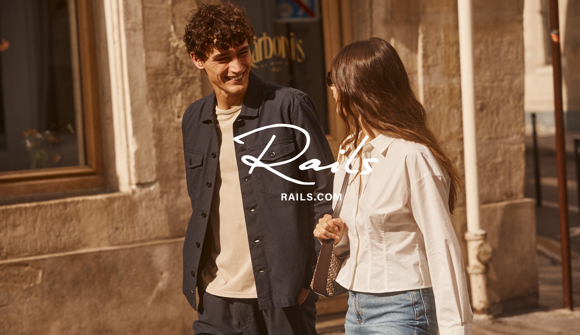 EDITORIAL IMAGE OF TWO MODELS WALKING. FIRST MODEL IS WEARING KEROUAC SHIRT JACKET. SECOND MODEL IS WEARING ANABELLE TOP