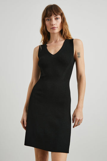 Adaline Ribbed, Sleeveless, Above-the-Knee Dress with Shoulder Straps and a V Neck in Black Colorway - Front View Featured on Model  