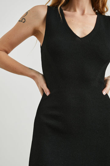 Adaline Ribbed, Sleeveless, Above-the-Knee Dress with Shoulder Straps and a V Neck in Black Colorway - Front View Featured on Model  