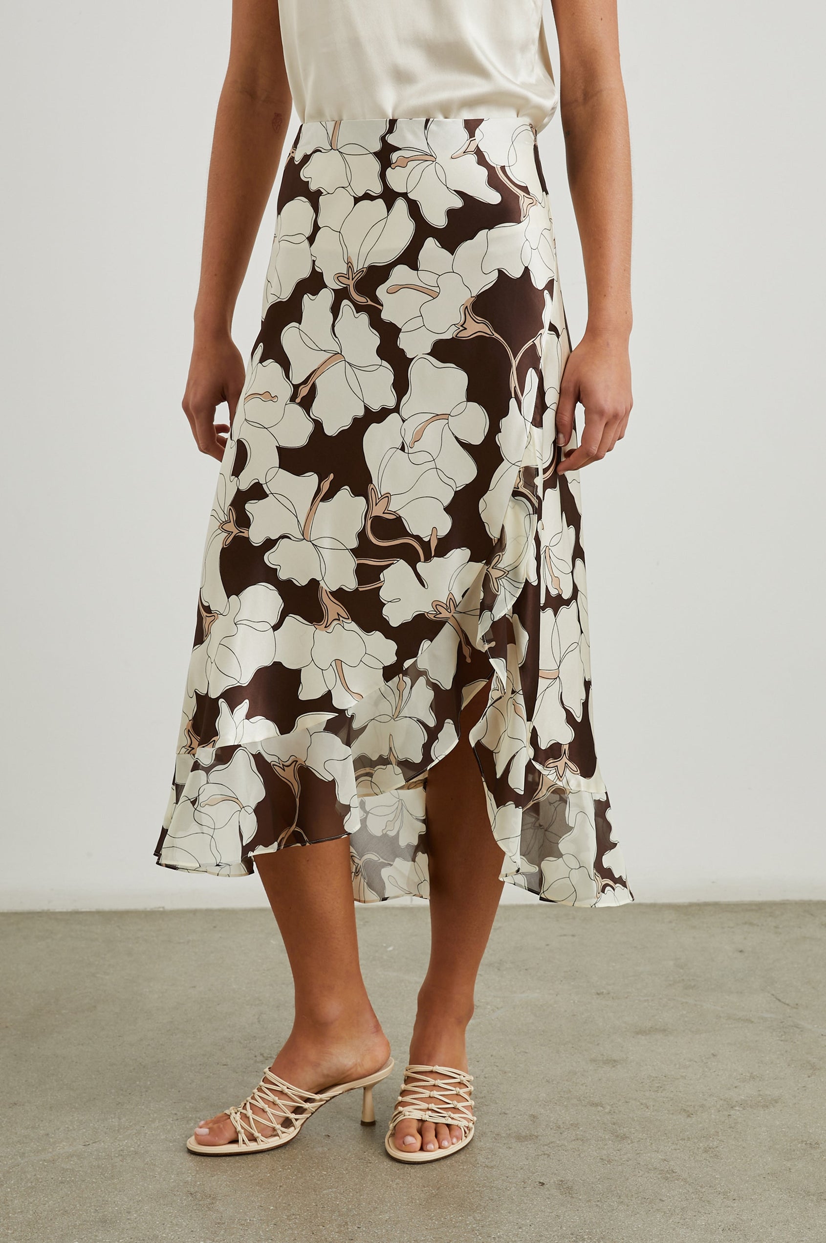 Adia Double Layer Midi Skirt in Mocha Floral Colorway, Cream Flowers on Mocha - Front View Featured on Model 