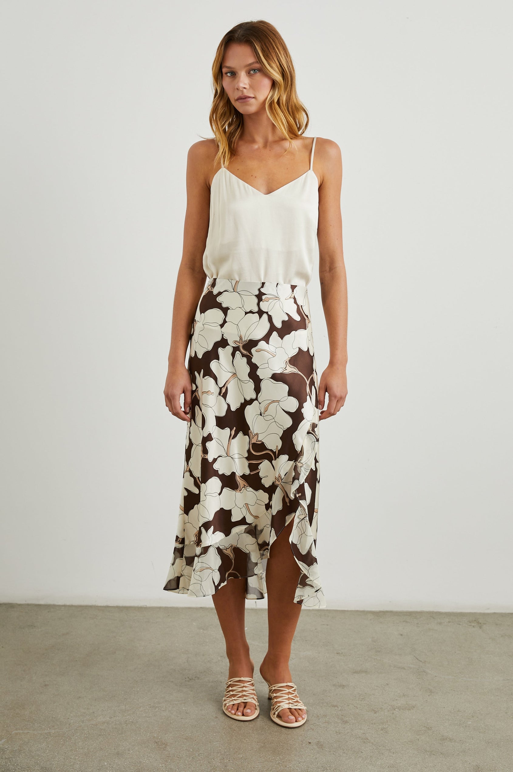 Adia Double Layer Midi Skirt in Mocha Floral Colorway, Cream Flowers on Mocha - Front Full Body View Featured on Model 