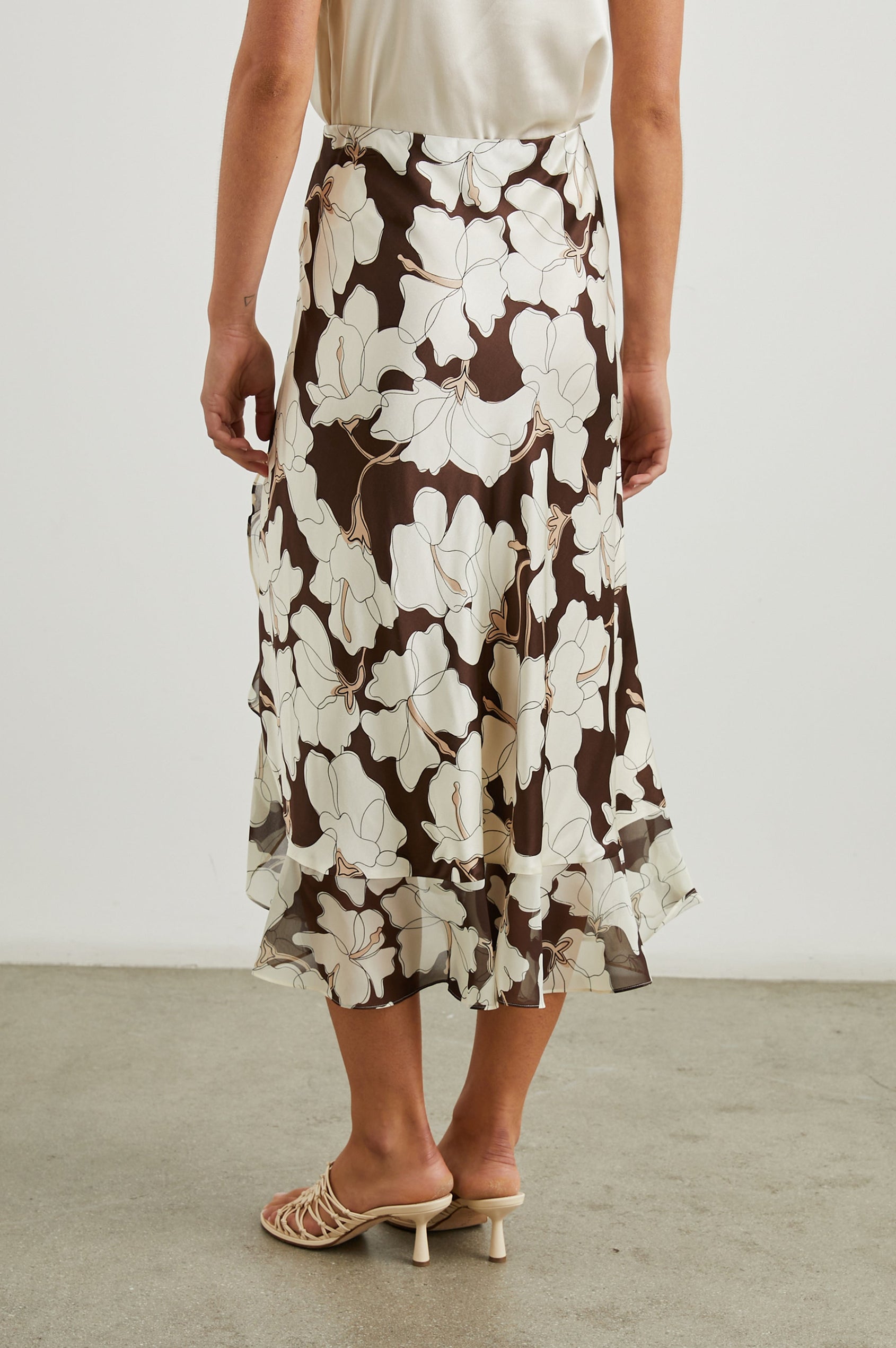 Adia Double Layer Midi Skirt in Mocha Floral Colorway, Cream Flowers on Mocha - Back View Featured on Model 