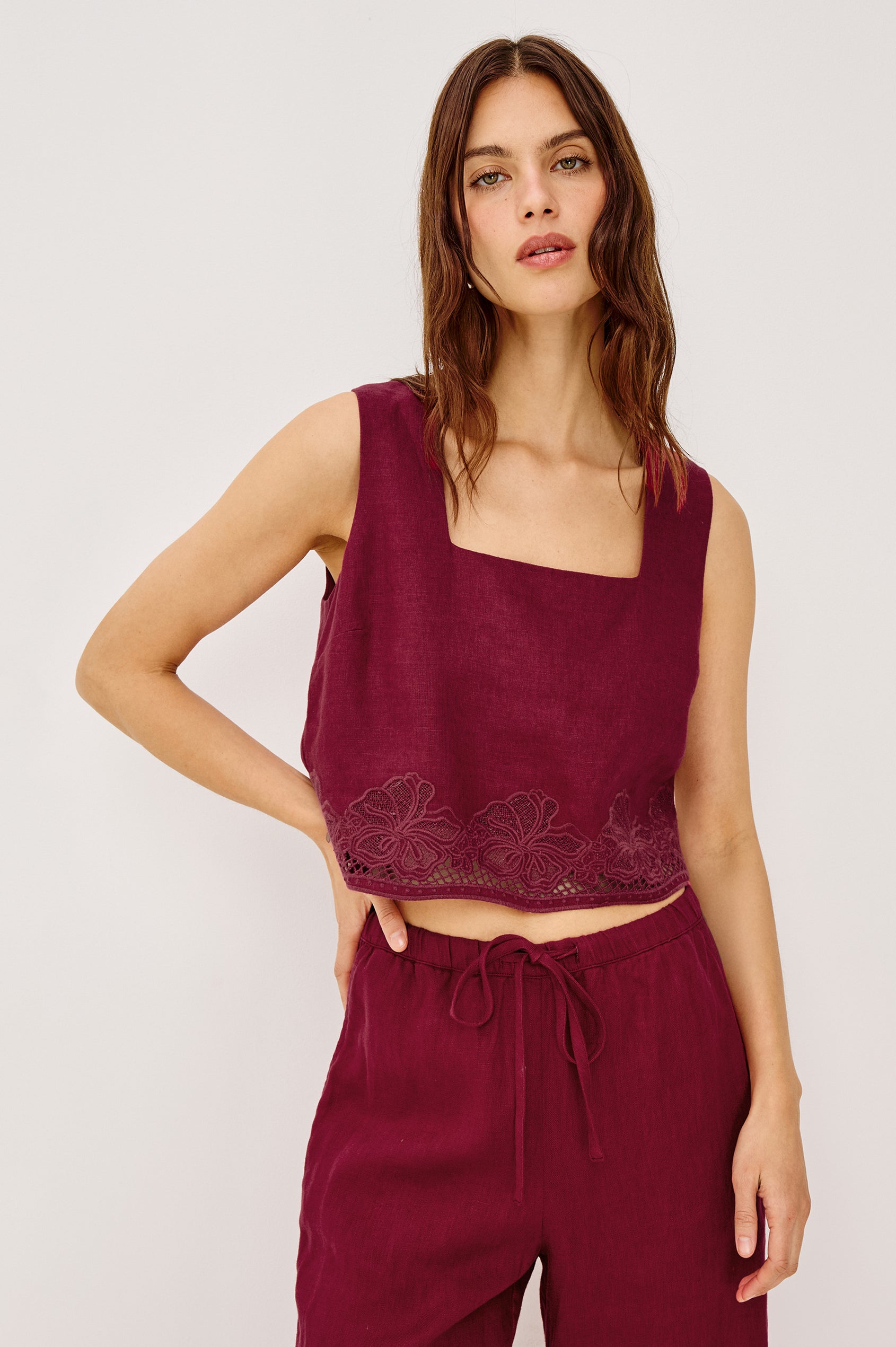 Akira Tank Top in Linen With Square Neckline Wide Fixed Shoulder Straps and Cropped Loose Fit in Berry Hibiscus Embroidery Colorway - Upper Body Front VIew Featured on Model