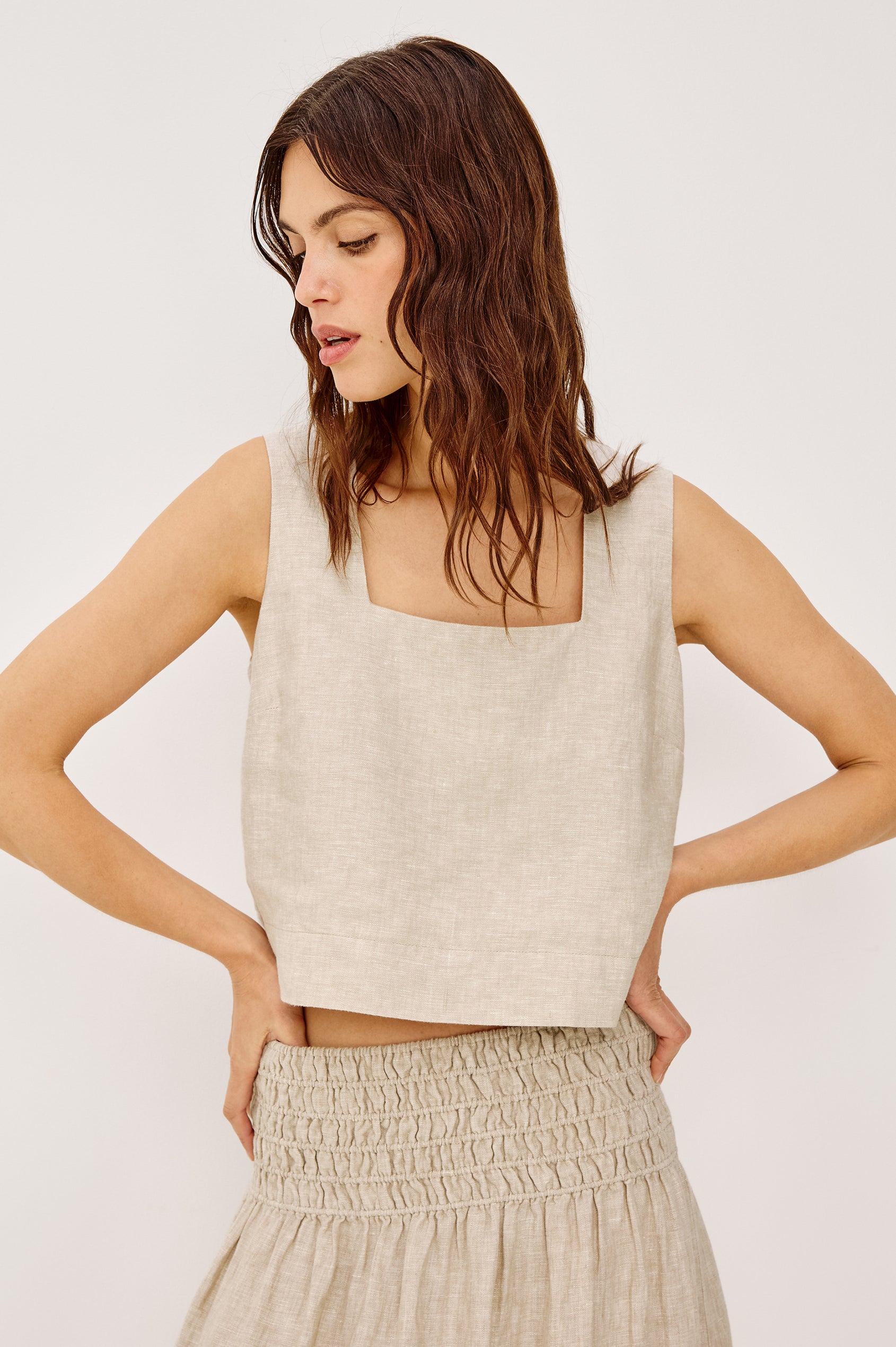 Akira Sleeveless Crop Top with Square Neckline and Wide Shoulder Straps in Heathered Flax Colorway - Front View Featured on Model