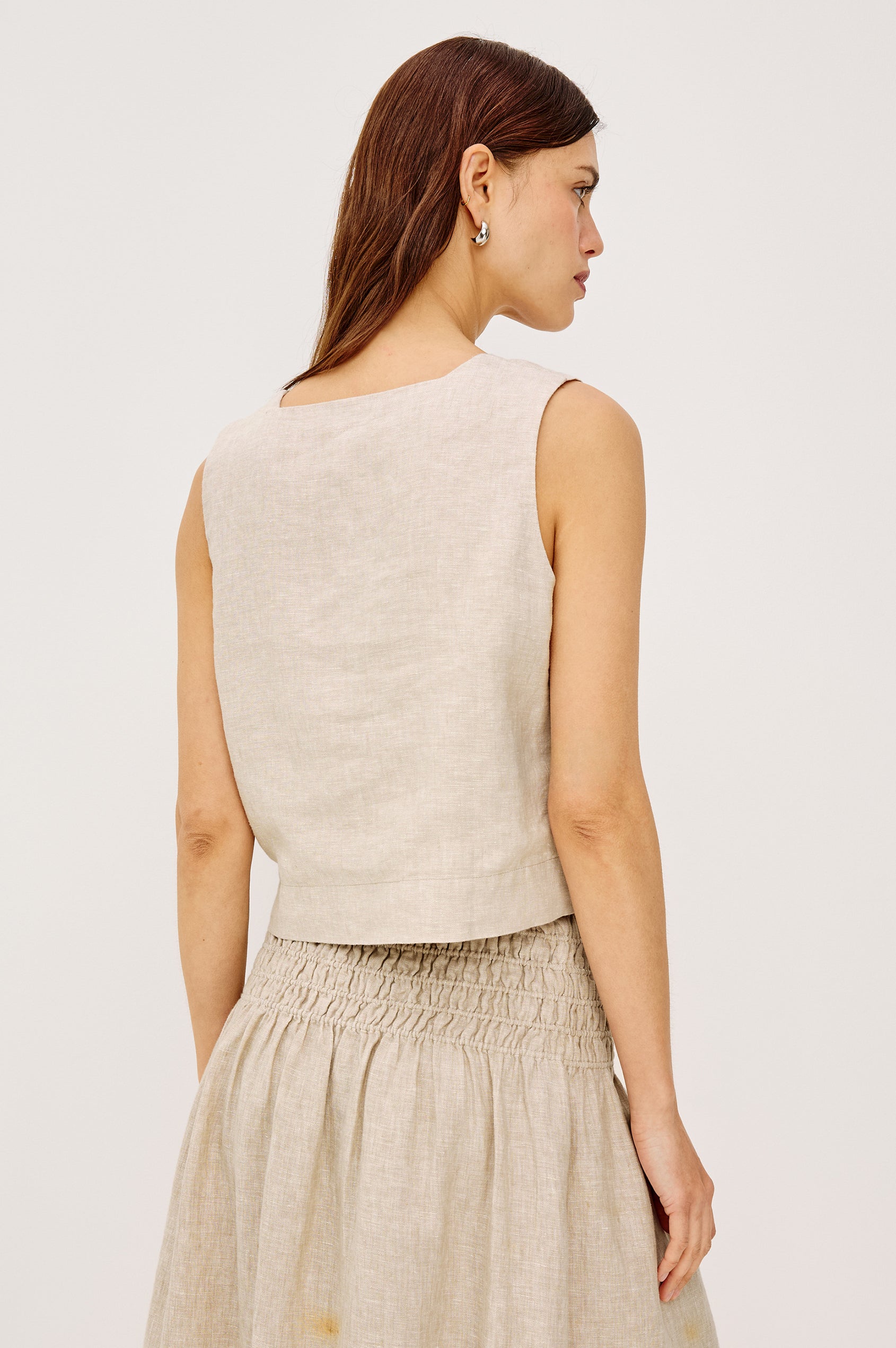 Akira Sleeveless Crop Top with Square Neckline and Wide Shoulder Straps in Heathered Flax Colorway - Front View Featured on Model