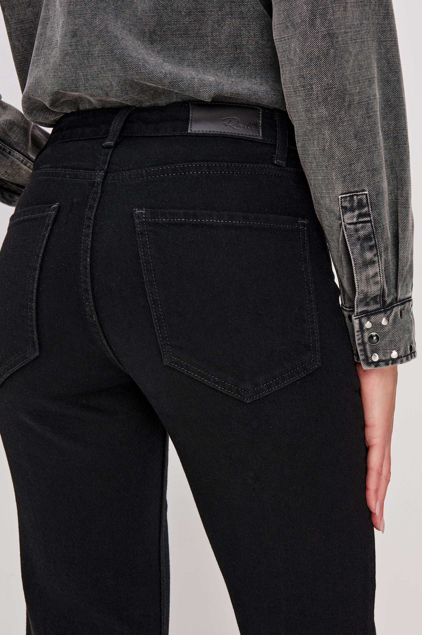 Alamitos Flared Trouser in Denim With Front Zip-Fly, Front Patch Pockets, 5-Pocket Styling, and Trouser Hem in Blackout Colorway - Lower Body Back View Featured on Model