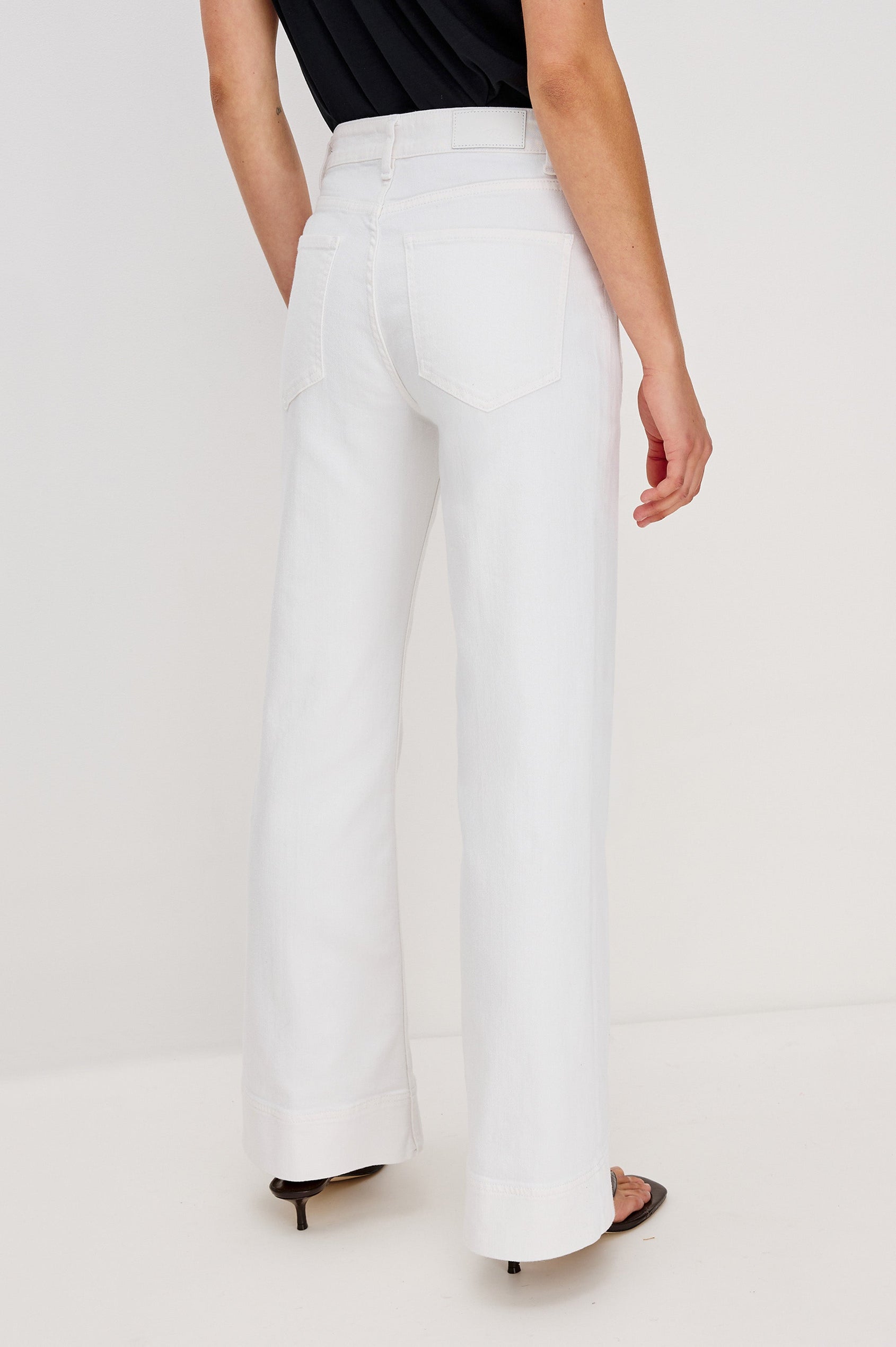 Alamitos Flared Denim Pant with Front Patch Pockets, Belt Loops and Zipper Button Fly in Salt White Colorway. Back View Shown on Model.