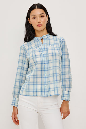 Alanna Long Sleeve Shirt with Snaps Down the Front, a Ruffled Collar, Banded Ruffed Cuffs, and Pleats at the Yoke Seam in Bluebell Ivory Colorway - Upper Body Front View fFeatured on Model