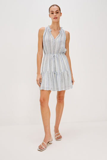Albany Mini Dress with a V-Neck, Encased Drawstring Tie Waist, Ruffle Neckline, 1 Tier on Skirt in Blue and White Multi Color - Antibes Stripe Colorway. Full Body Front View Shown on Model. 