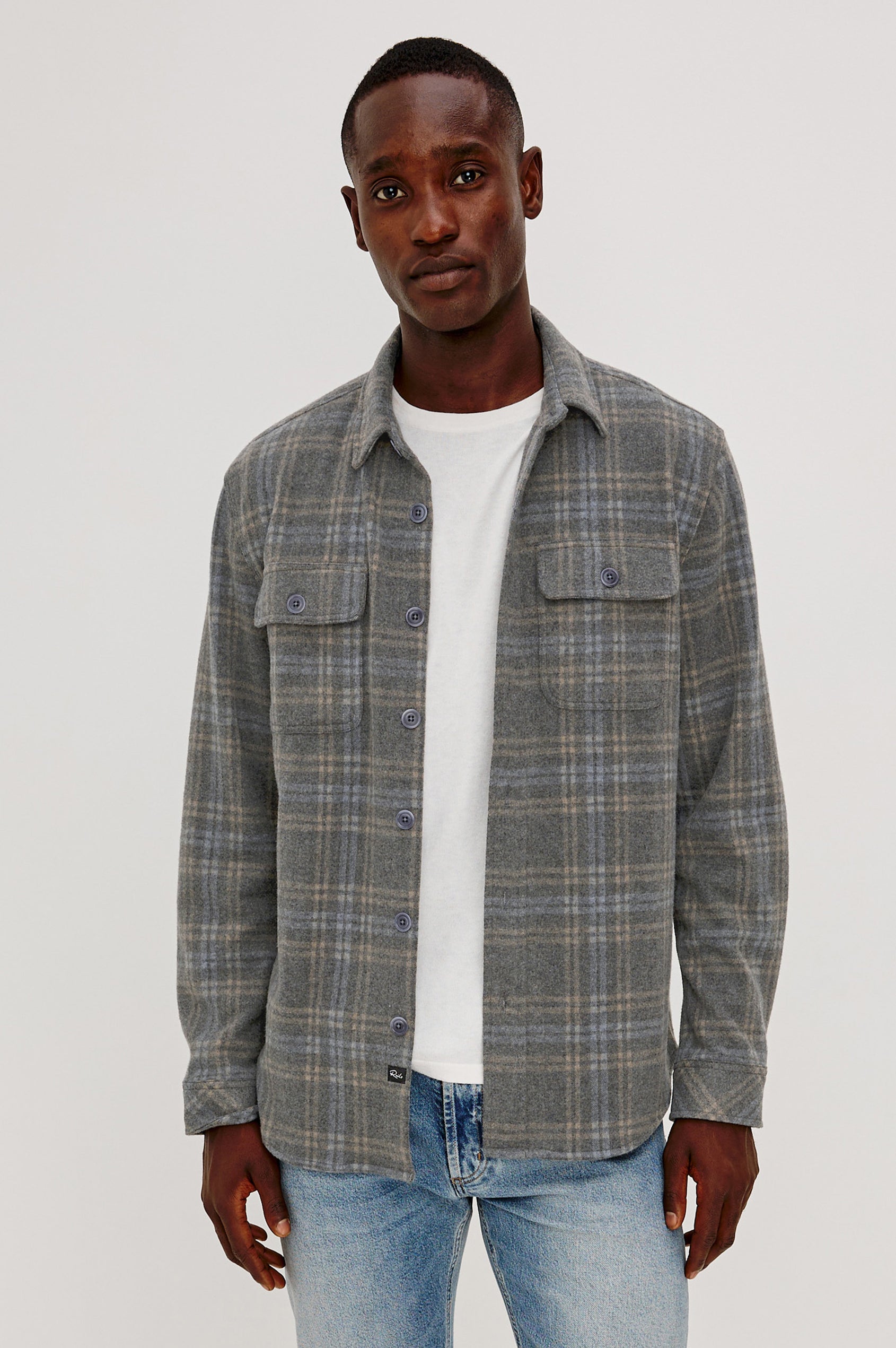 Alder Overshirt in Brushed Flannel With Collar, Button Front, Long Sleeves With Buttoned Cuffs, Back Yoke, Dual Chest Flap Pockets, and Classic Fit in Coastal Iron Heather Colorway - Upper Body Front View Featured on Model