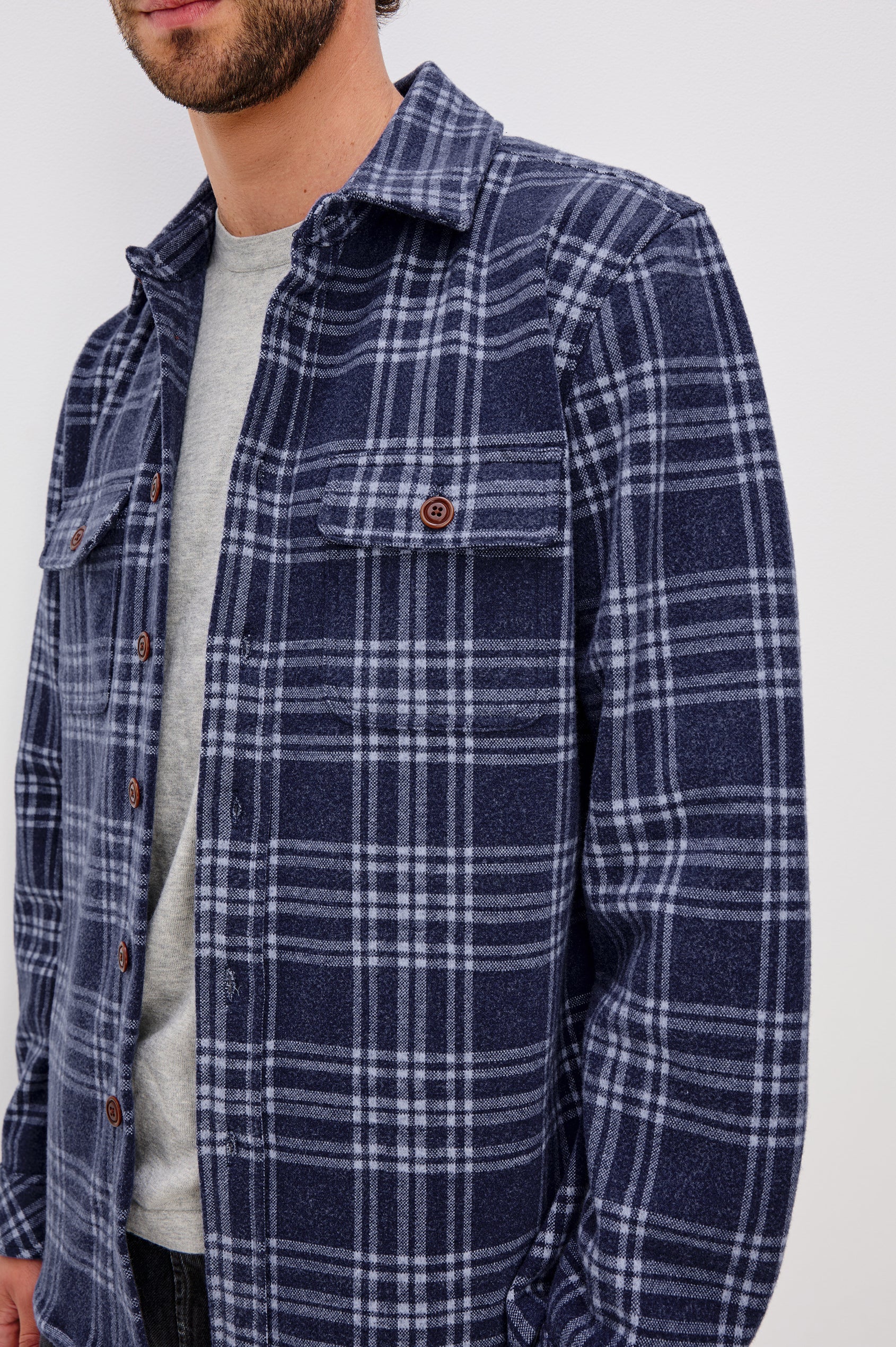 Alder Button Front Plaid Shirt in Brushed Stretch Cotton Blend With Collar, Buttoned Flap Chest Pockets, and Long Sleeves in Frost Harbor Colorway - Upper Body Front Close Up View Featured on Model