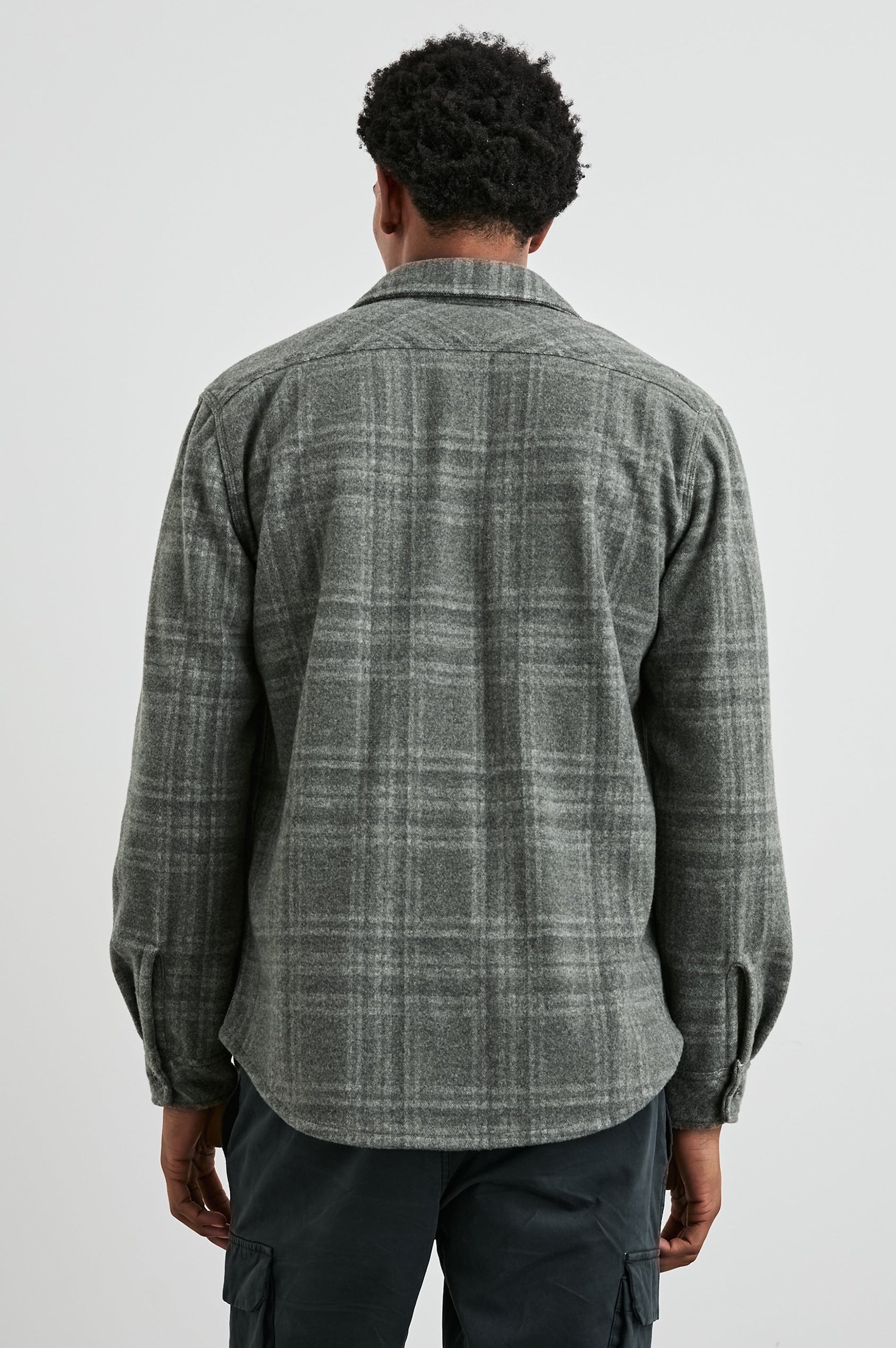 Alder Long-Sleeve Button up with Two Buttoned Chest Flap Pockets in Mossy Glen Colorway, a plaid - Back View Featured on Model