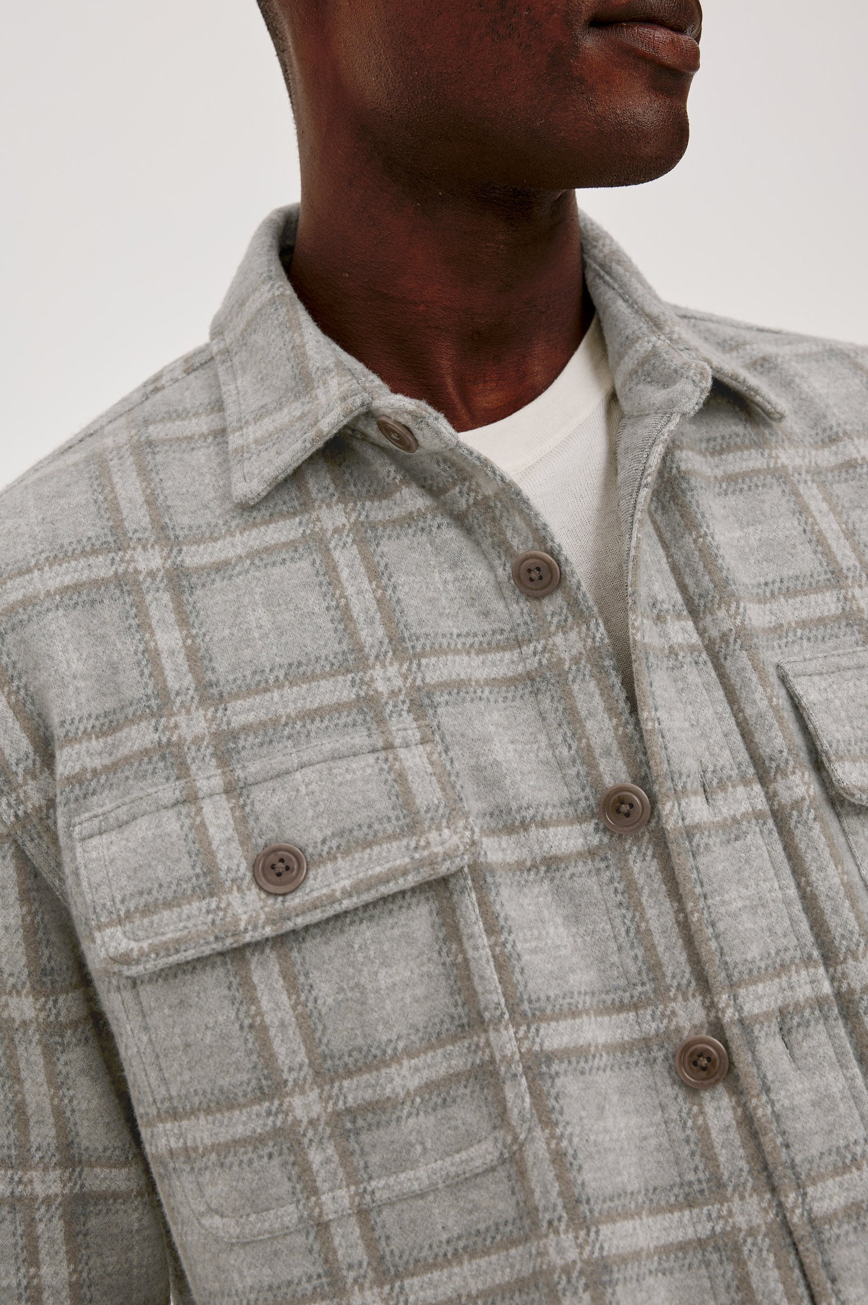 Alder Overshirt in Brushed Flannel With Collar, Button Front, Long Sleeves With Buttoned Cuffs, Back Yoke, Dual Chest Flap Pockets, and Classic Fit in Quarry Mist Heather Colorway - Upper Body Front View Featured on Model