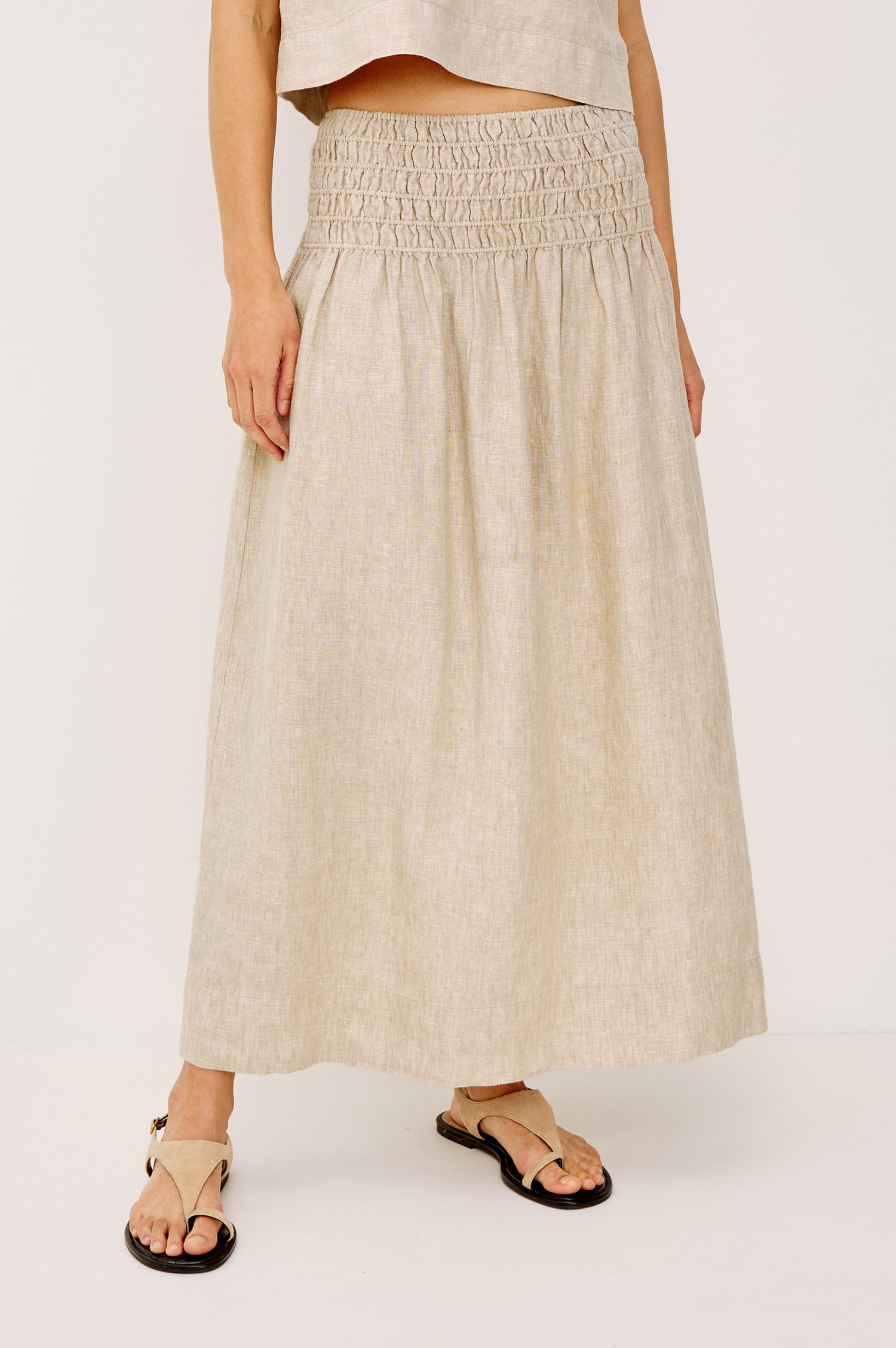 Alessa Midi Skirt in Heavy Linen With Wide Smocked Waistband and A-Line Silhouette in Heathered Flax Colorway - Lower Body Front View Featured on Model