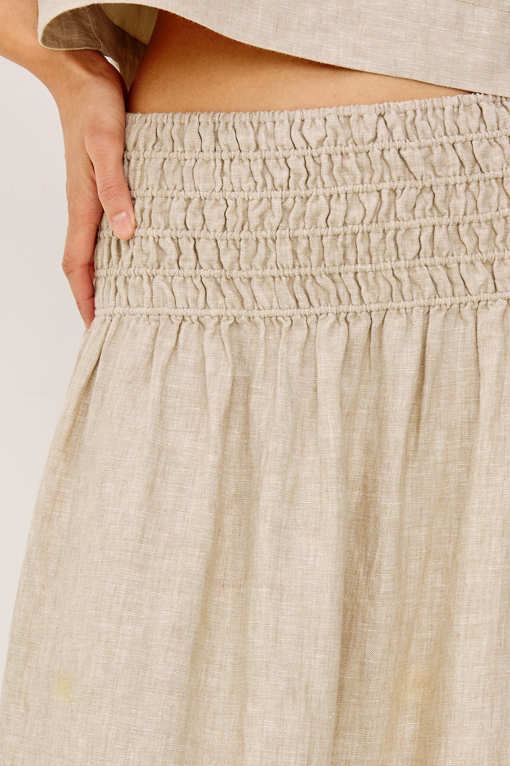 Alessa Midi Skirt in Heavy Linen With Wide Smocked Waistband and A-Line Silhouette in Heathered Flax Colorway - Lower Body Front View Featured on Model