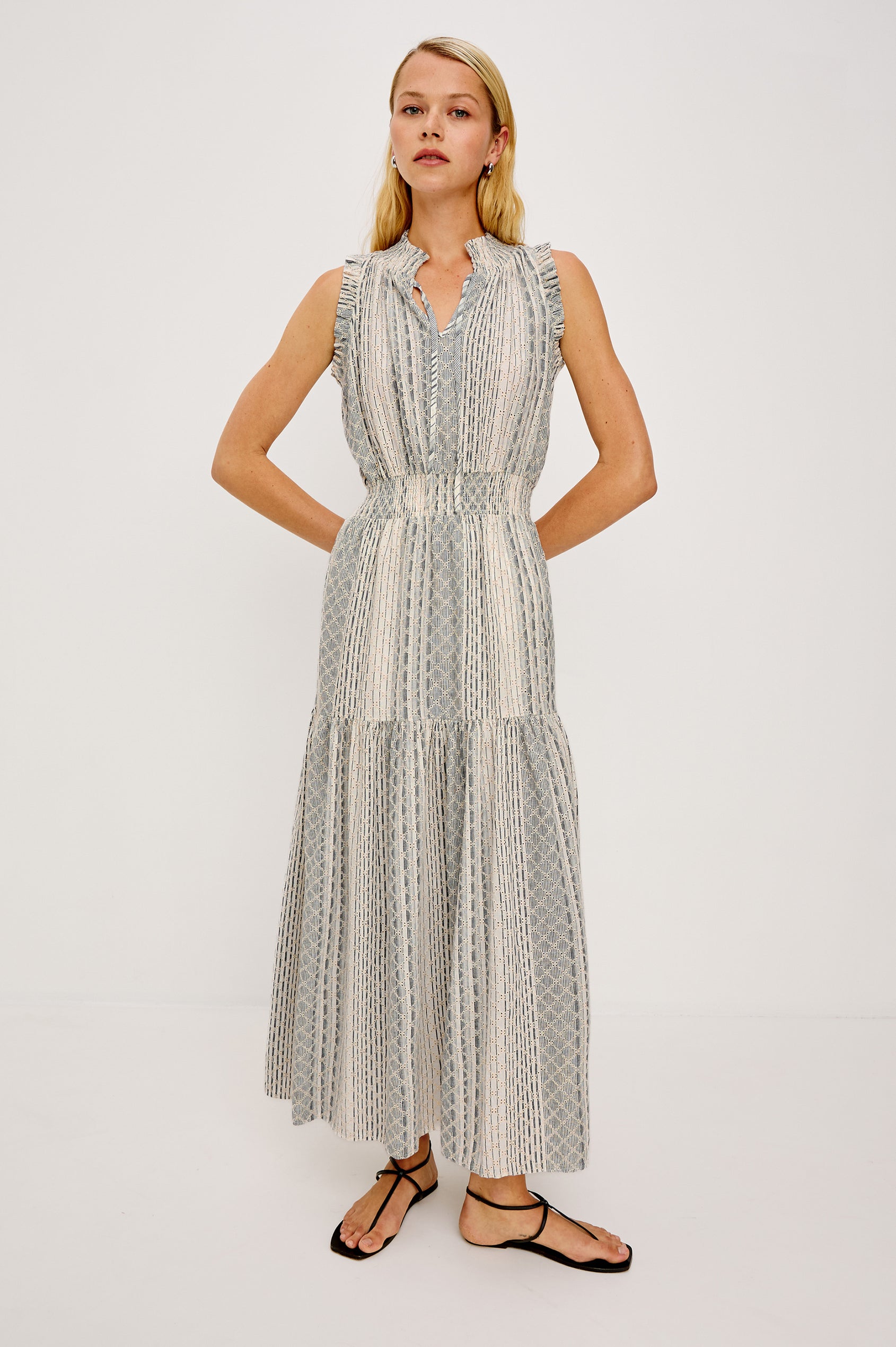 Alessi Maxi Dress in Linen With Smocked Split V-Neckline With Center-Front Ties Diamond Eyelet Detailing All Over Ruffled Trim and Fully Lined Tiered Skirt in Striped Eyelet Colorway - Full Body Front View Featured on Model