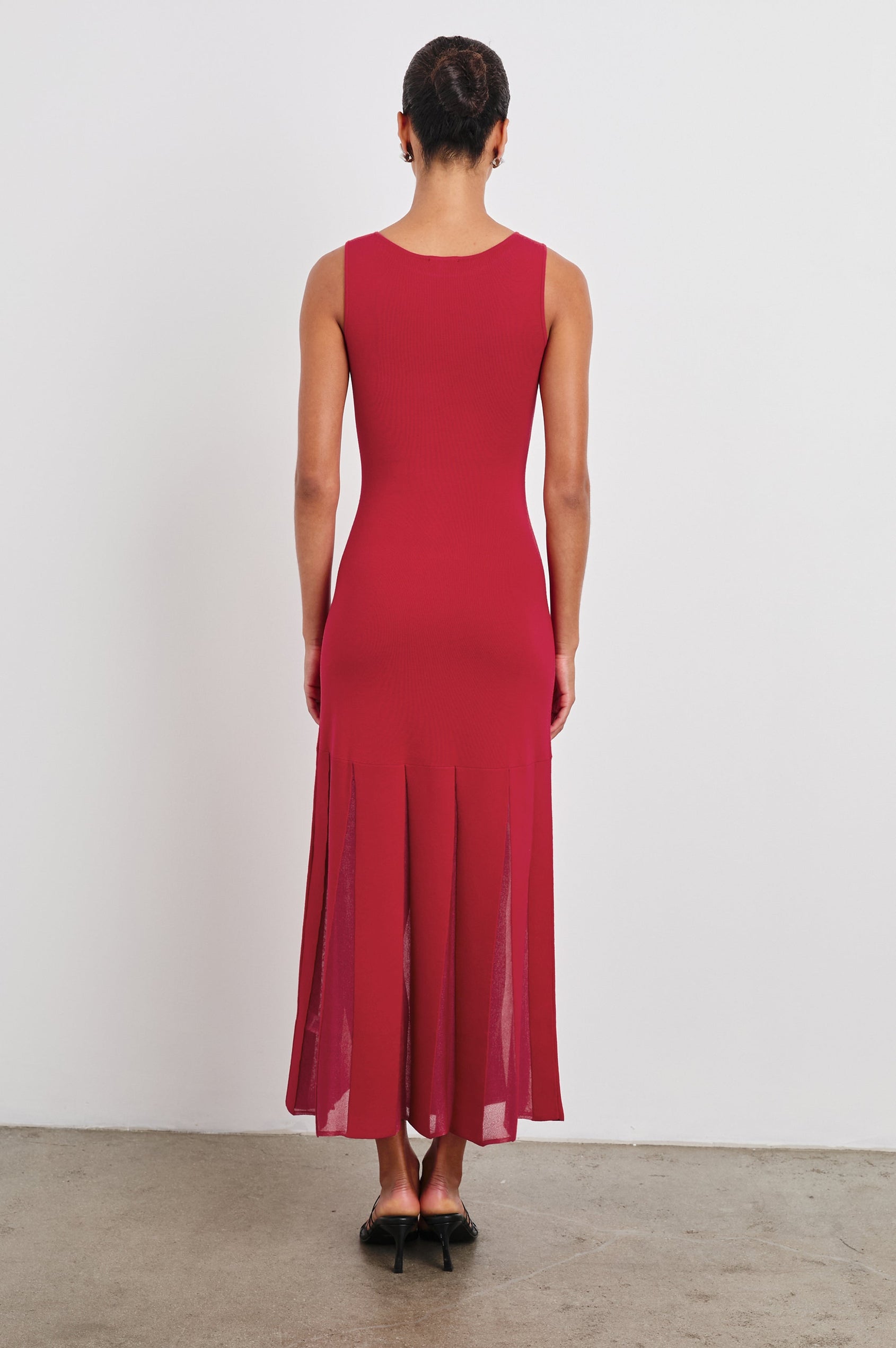 Alessia Sleeveless Maxi Dress with a Crew Neck and Sheer Vertical Inserts along the Hem from the Mid-Thigh in Scarlet Colorway - Back Full Body View Featured on Model 