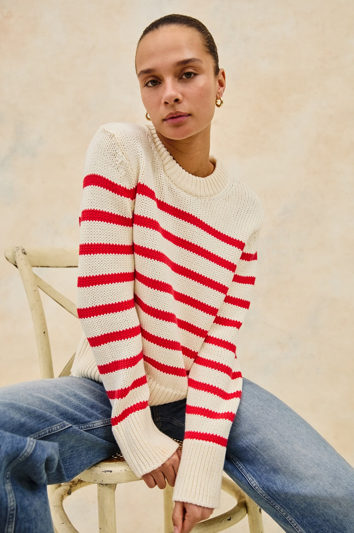 Alise crewneck wool sweater with ribbed detailing on cuffs and collar in Cherry Stripe - stylized front view on model