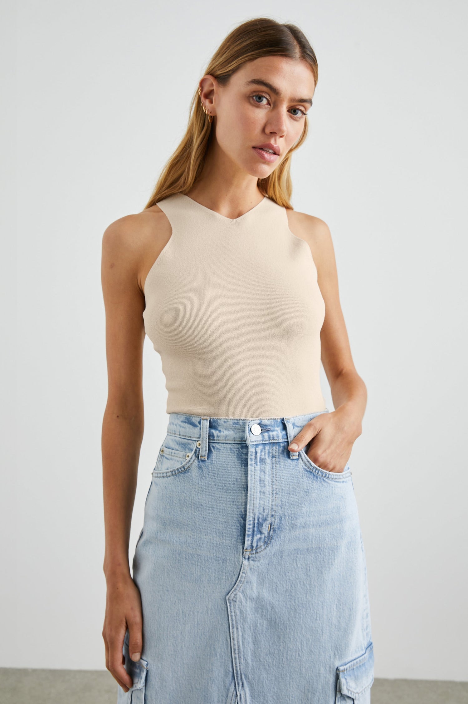 Ally Tank with a High V Neck in Ivory Colorway - Front Tucked View Featured on Model 
