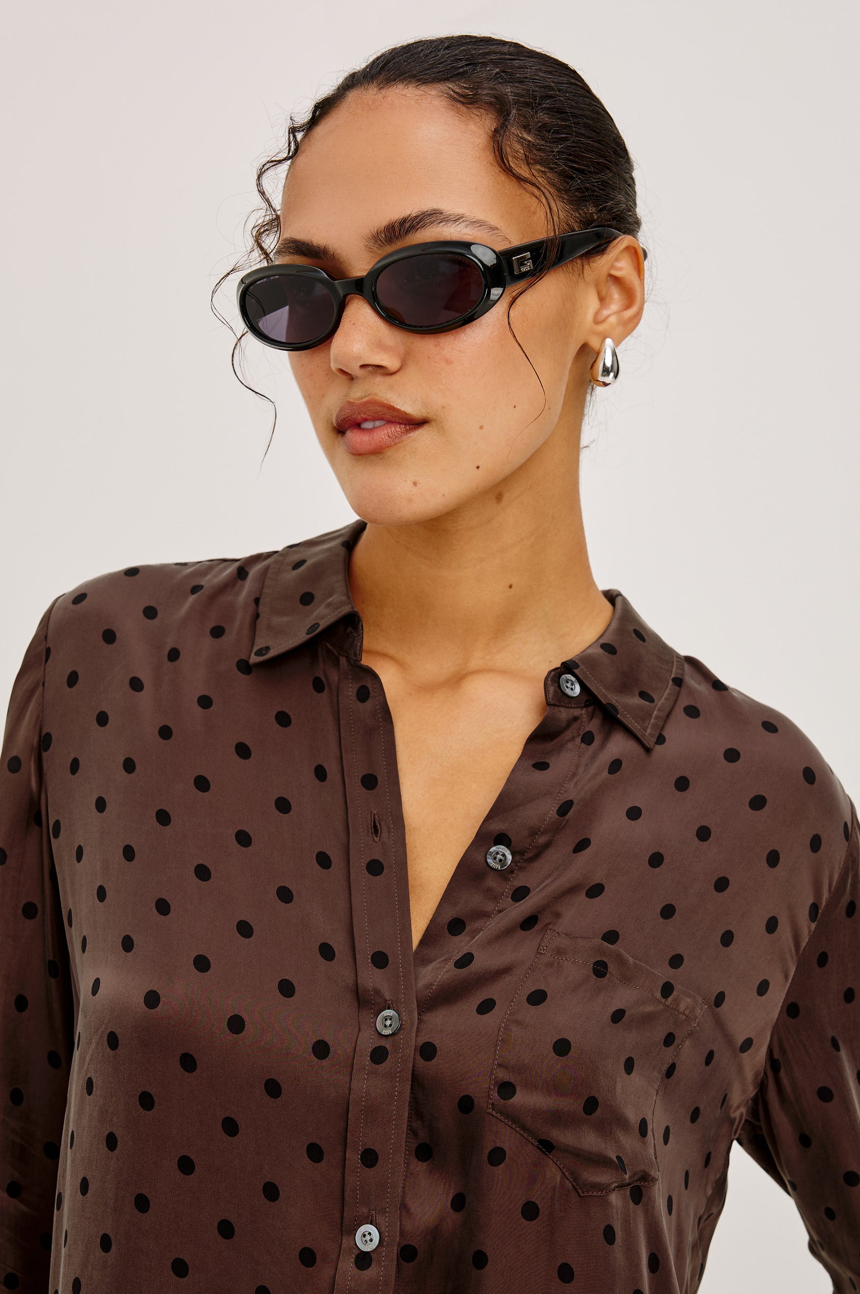 Alyssa Shirt in Luxe Lightweight Cupro With Loose Fit, Collar, Front Buttons, Long Sleeves, and Curved Back Hem in Olive Jaguar Colorway - Upper Body Front View Featured on Model