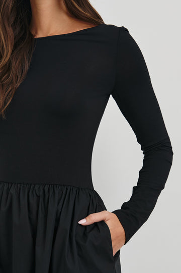 Amberly Long-Sleeve Midi Dress with Boat Neckline in Black Colorway - Front View Featured on Model