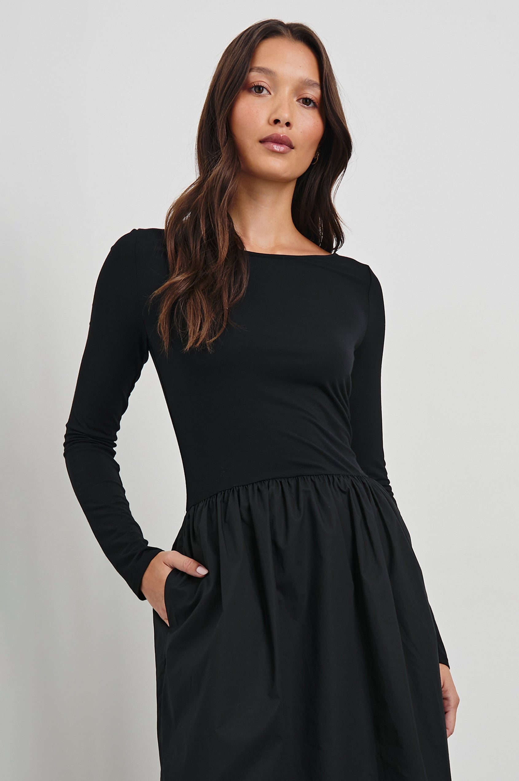 Amberly Long-Sleeve Midi Dress with Boat Neckline in Black Colorway - Front View Featured on Model