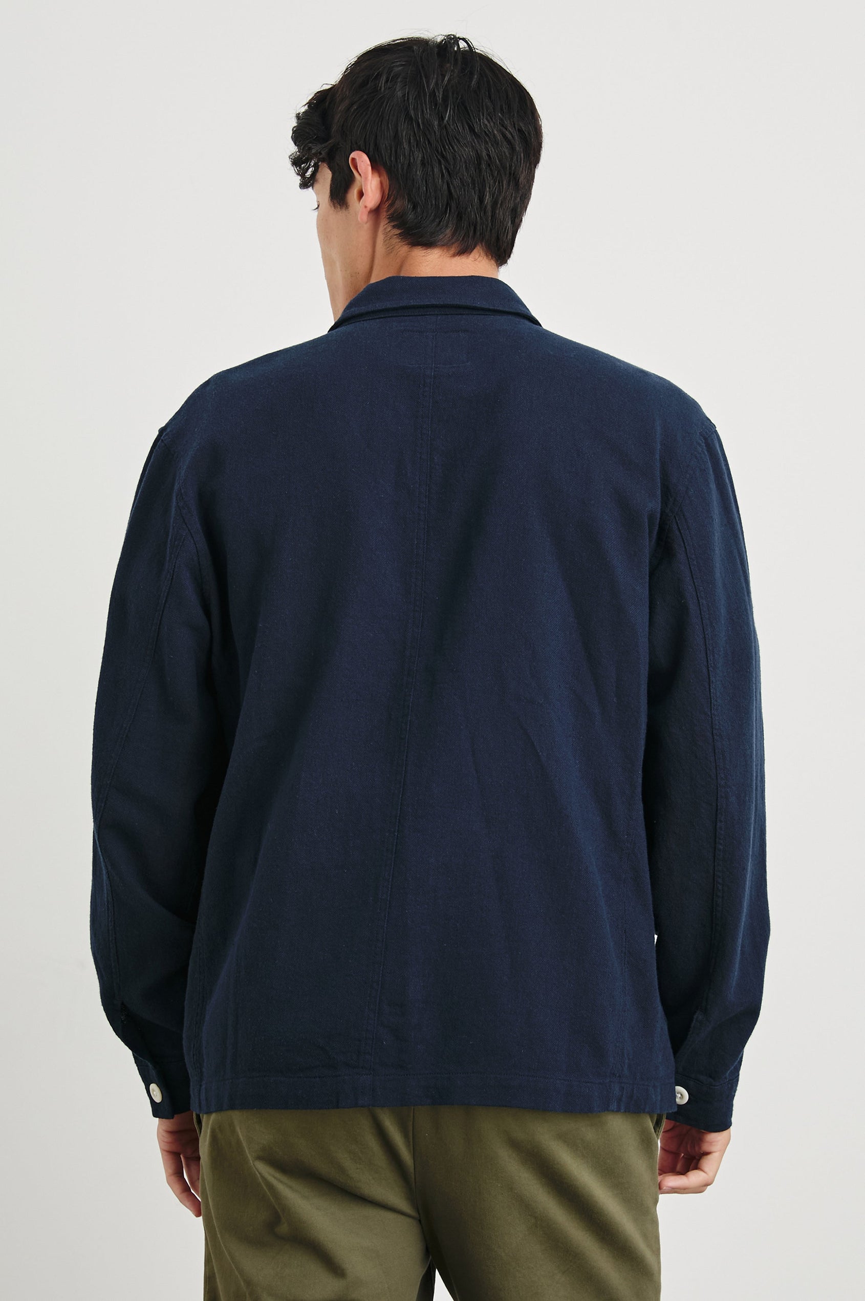Ambrose Jacket with Button Closure and Two Front Patch Pockets and a Chest Patch Pocket in Deep Meridian Colorway - Back View Featured on Model