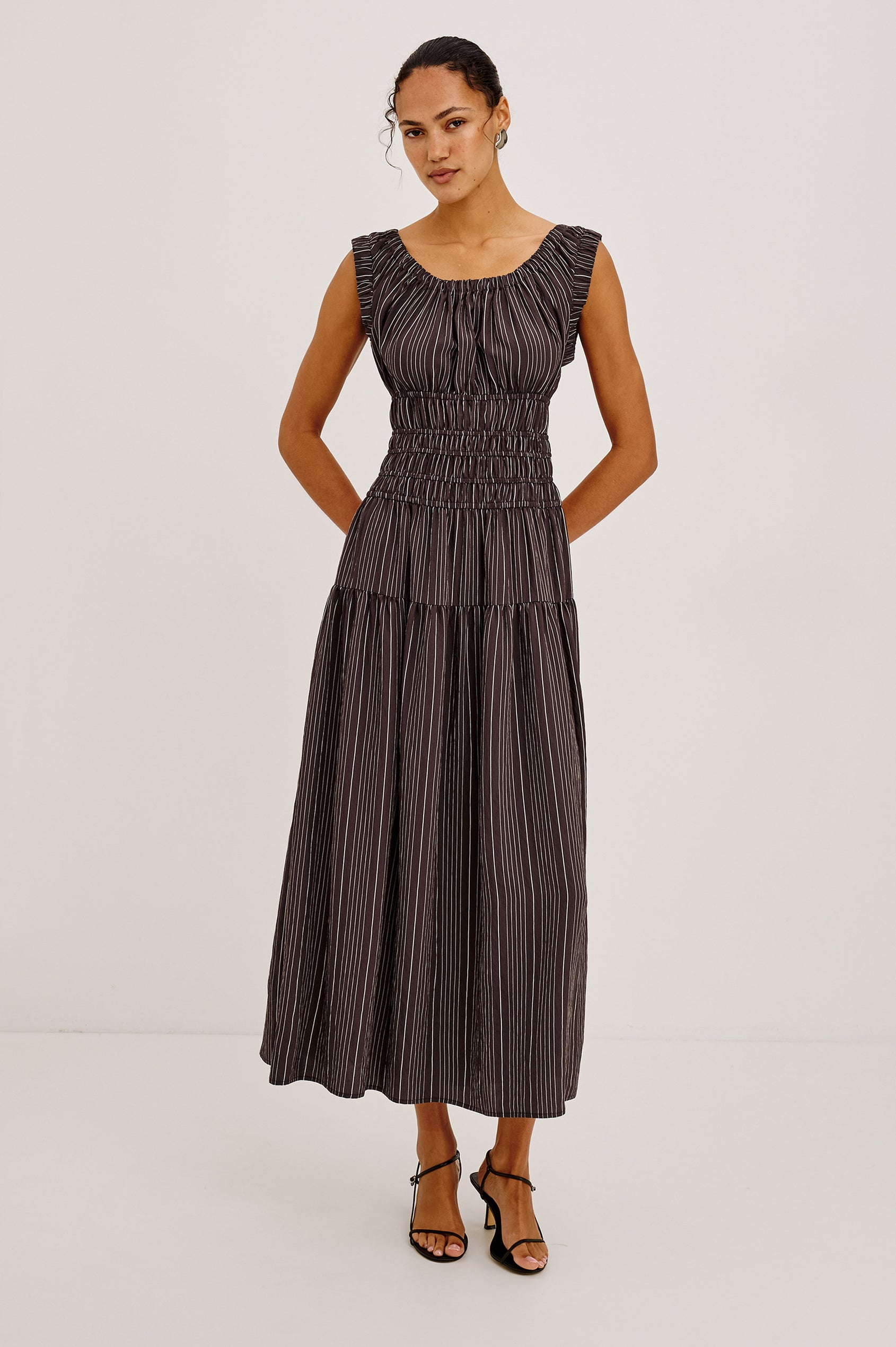 Anastasia Midi Dress With Elastic Scoop Neckline and Sleeveless Design, Laddered Waist Elastic, and Lined Single Tiered Skirt in Chicory Stripe Colorway - Full Body Front View Featured on Model