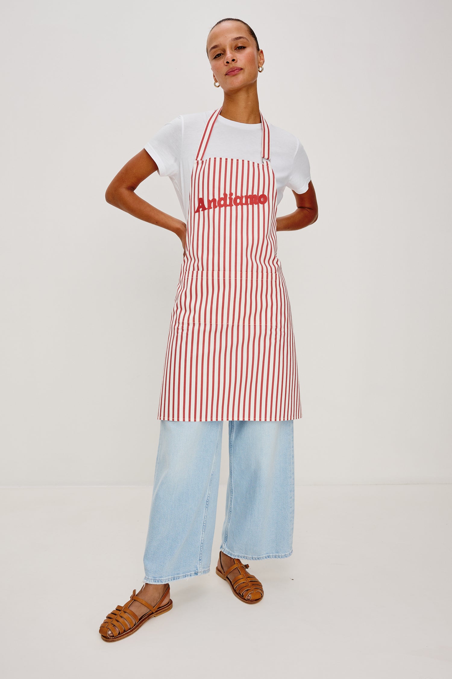 Apron in Cotton With Adjustable Halter Strap and Back Ties in Ravello Stripe Colorway - Full Body Front View Featured on Model