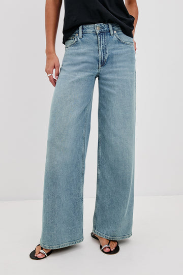 Angeleno mid right slouchy wide leg jean in light wash Blue Eyed Girl - front view on model