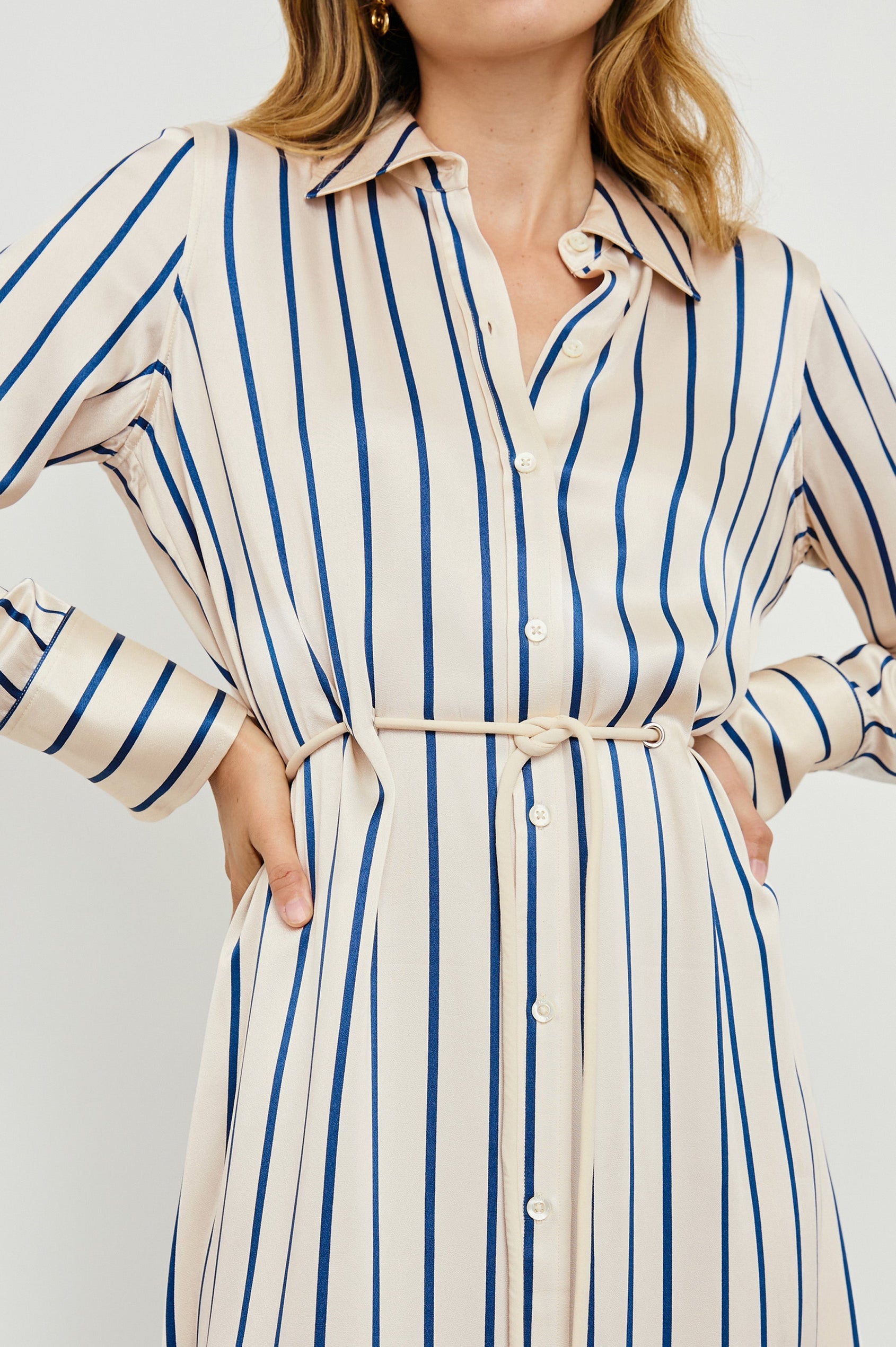 Anina Long-Sleeve Midi Dress with Buttons Down the Front, a Collar, Button Cuffs, and a Cord Belt in Ceramic Navy Stripe Colorway, Vertical Stripes - Front View Featured on Model
