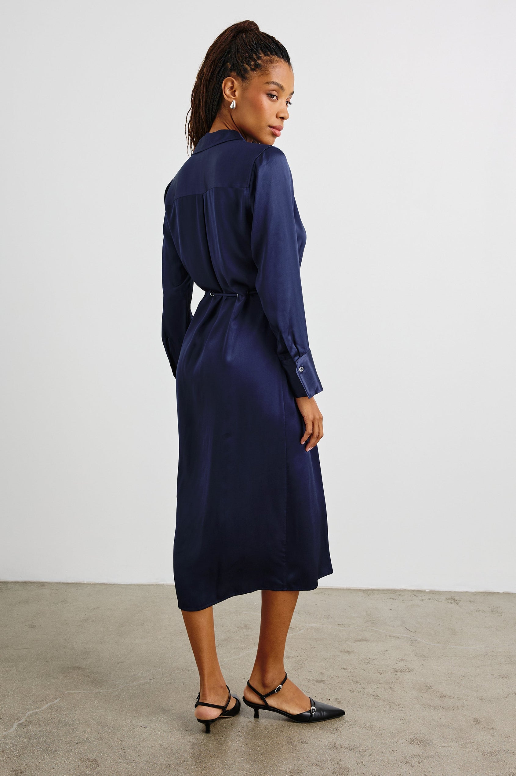 Anina Long-Sleeve Midi Dress with Buttons Down the Front, a Collar, Button Cuffs, and a Cord Belt in Navy Colorway - Back Full Body View Featured on Model