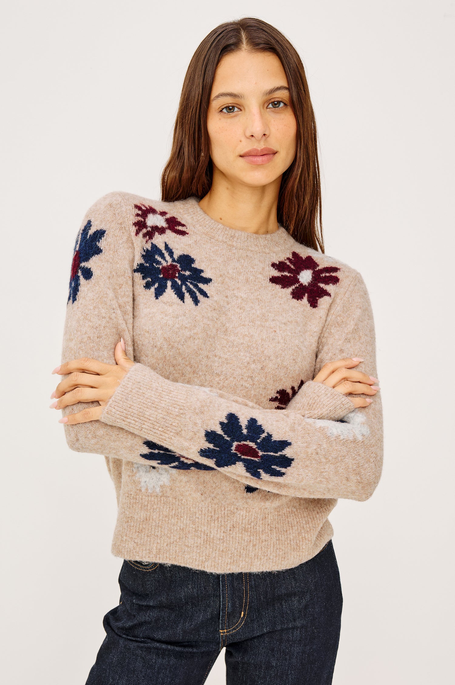 Anise sweater is knitted from a cozy wool blend that features a classic crew neckline, long sleeves, and a relaxed, boxy fit. Front view of model featured.