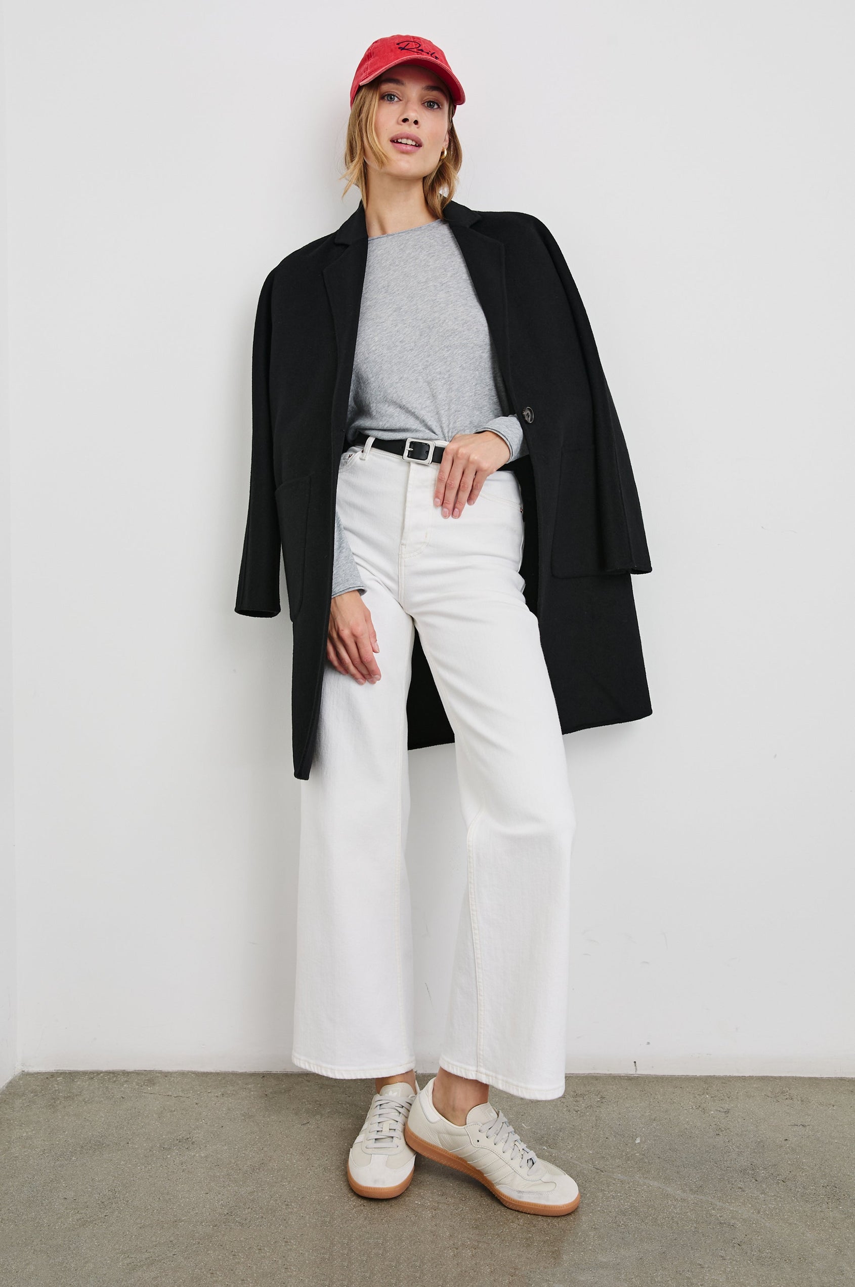 Anniversary Baseball Cap with an Adjustable Back Strap, Front Text, Rails, and Back Text, Est 2009, in Washed Red Colorway, with Blue Text - Front Full Body View Featured on Model