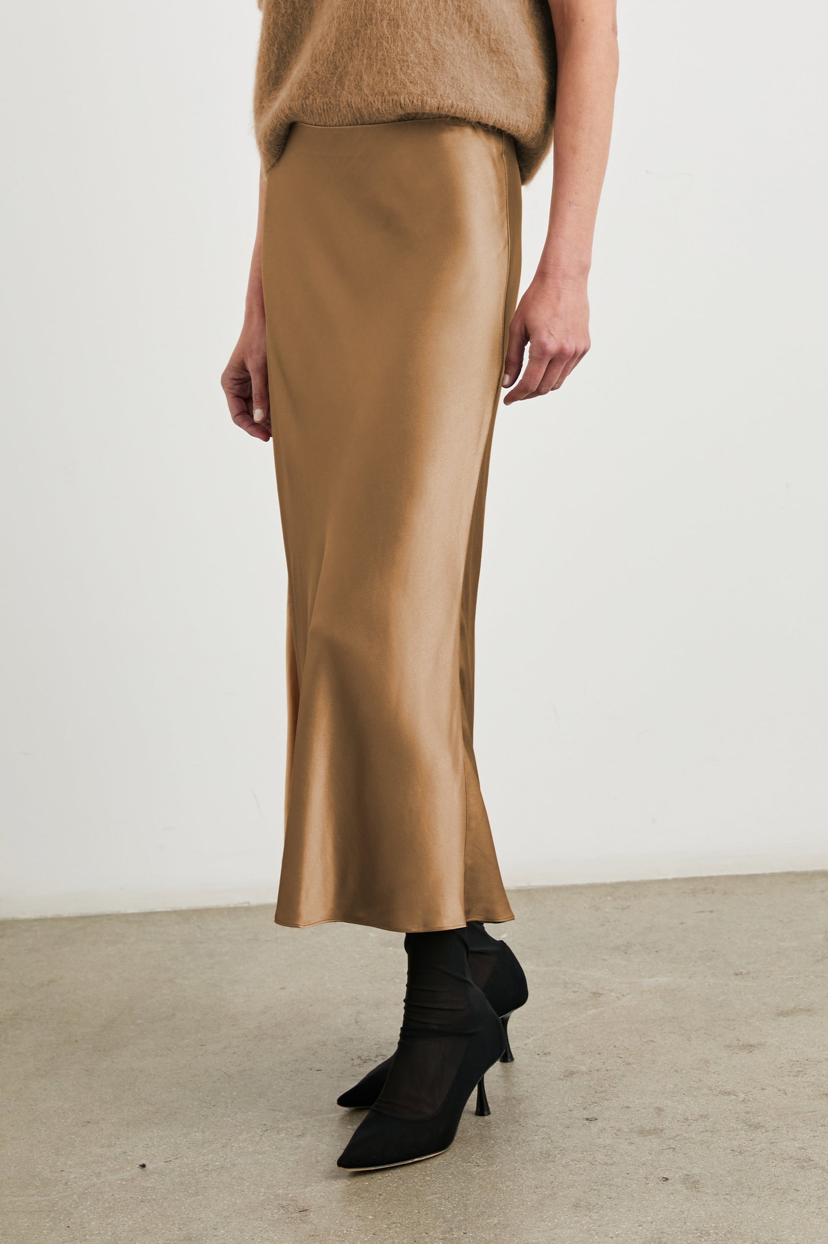 Anya High-waisted Midi Skirt in Camel Colorway - Front View Featured on Model