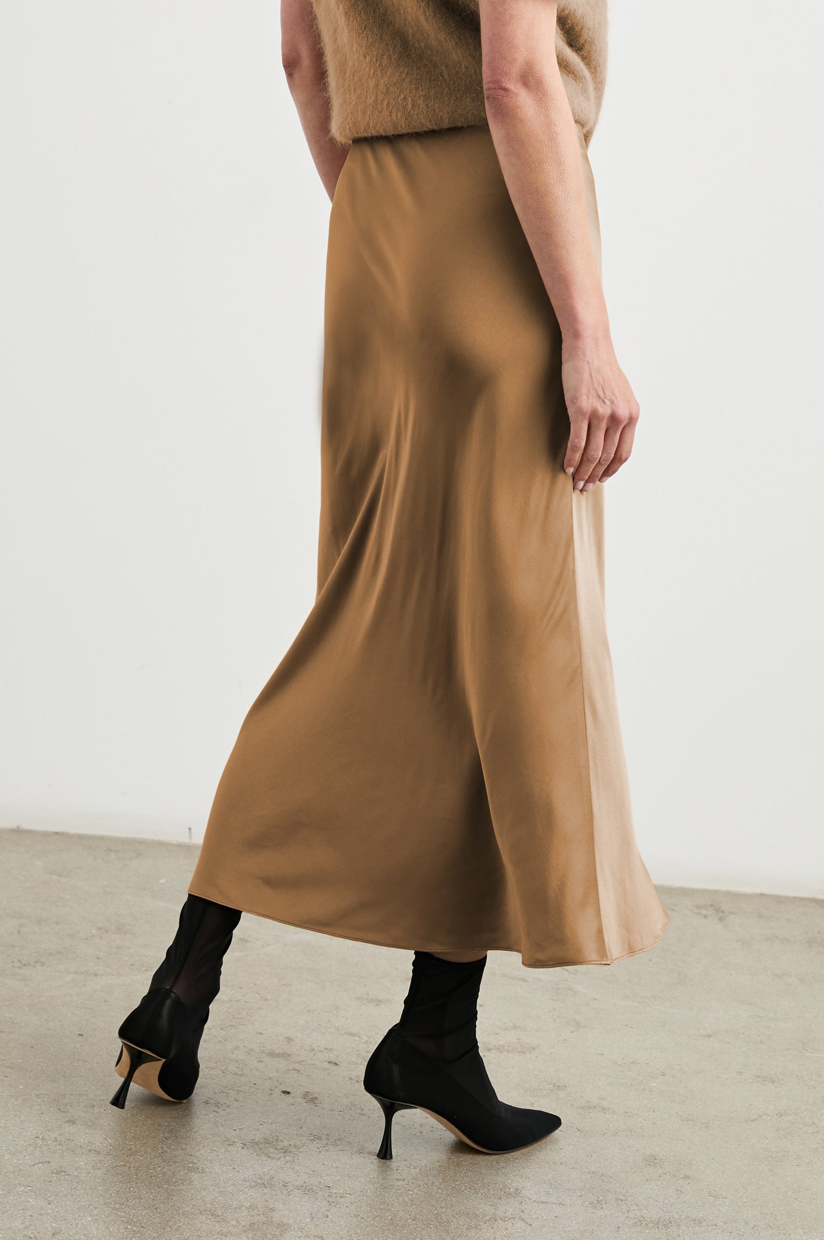 Anya High-waisted Midi Skirt in Camel Colorway - Back View Featured on Model