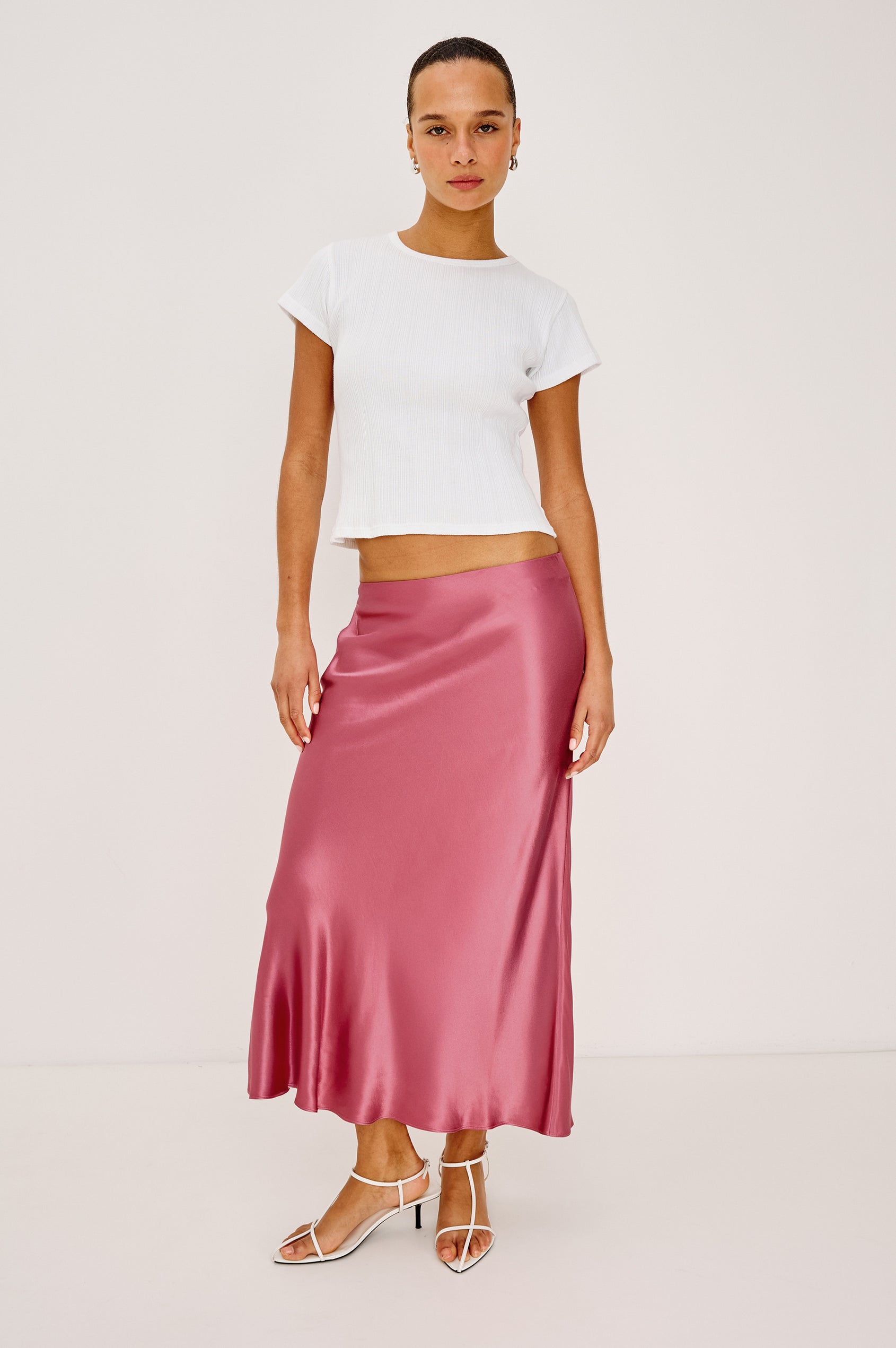 Anya High-Waisted Midi Skirt in Satin Crepe With Side Slit in Dark Rose Colorway - Full Body Front View Featured on Model