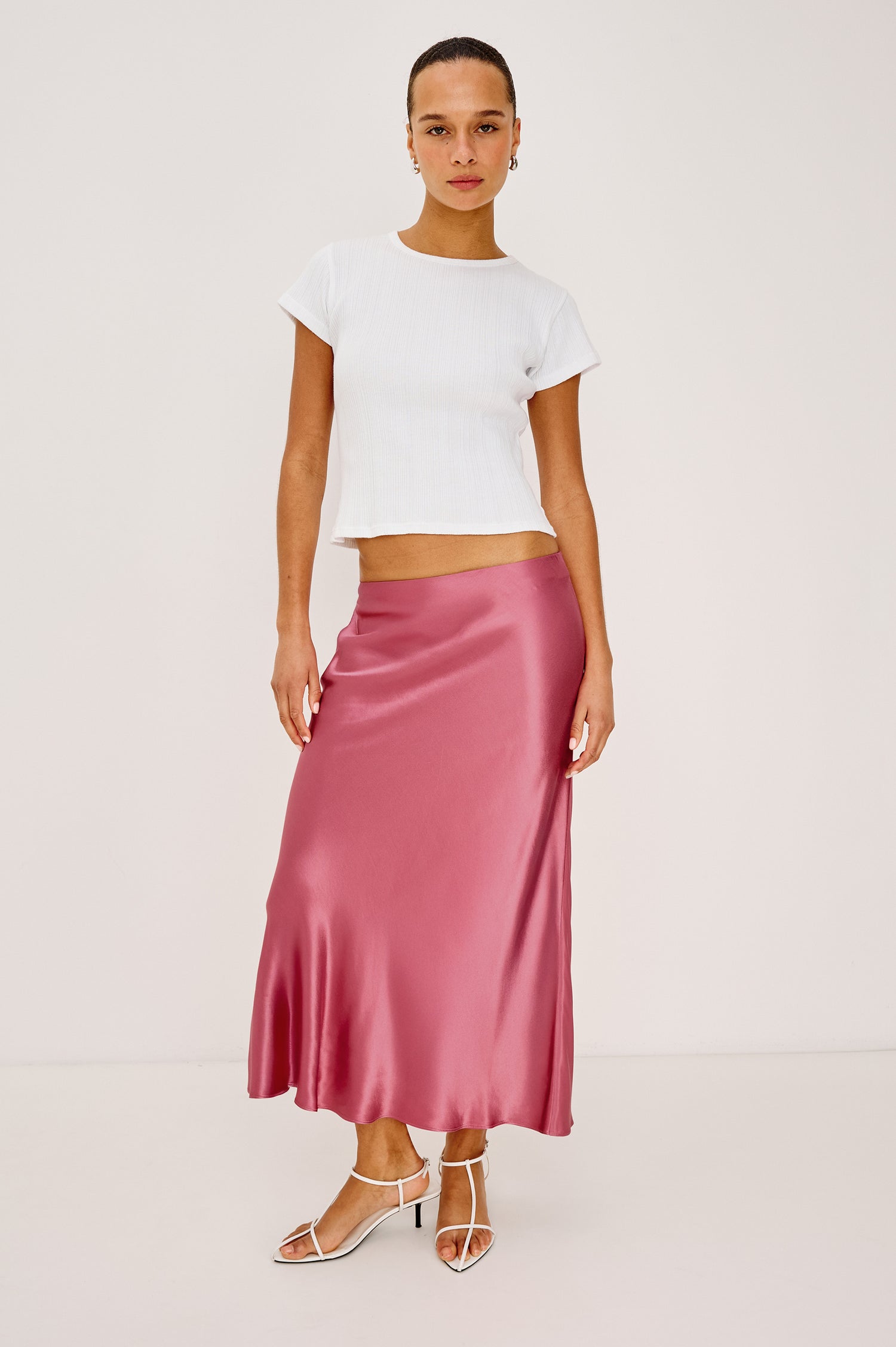 Anya High-Waisted Midi Skirt in Satin Crepe With Side Slit in Dark Rose Colorway - Full Body Front View Featured on Model