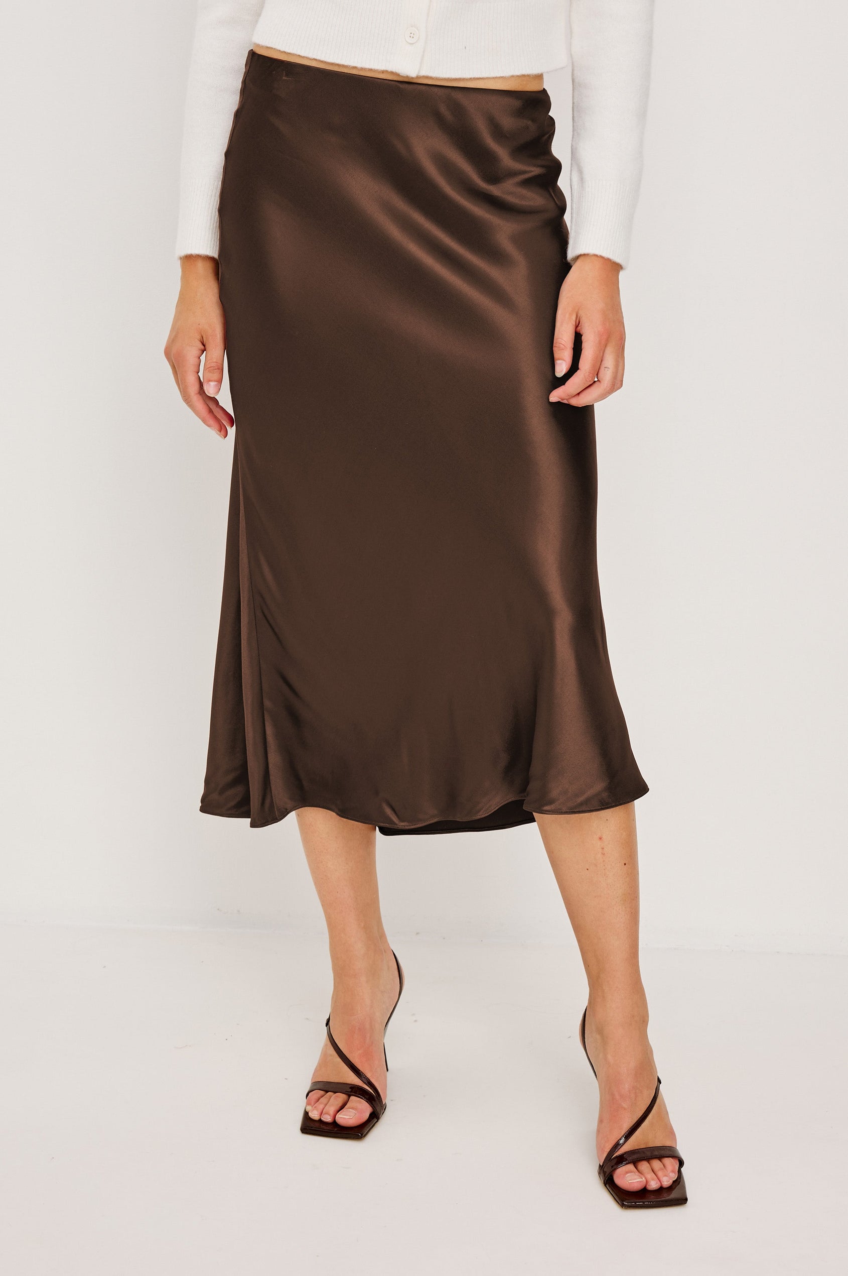 Anya High-waisted Midi Skirt in Espresso Brown Colorway - Front View Featured on Model, lower half of body