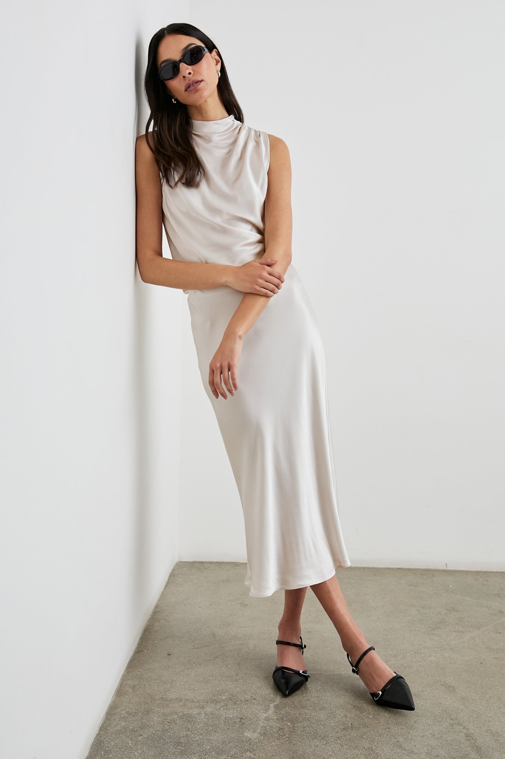 Anya High-waisted Midi Skirt in Ivory Colorway - Front Full Body View Featured on Model