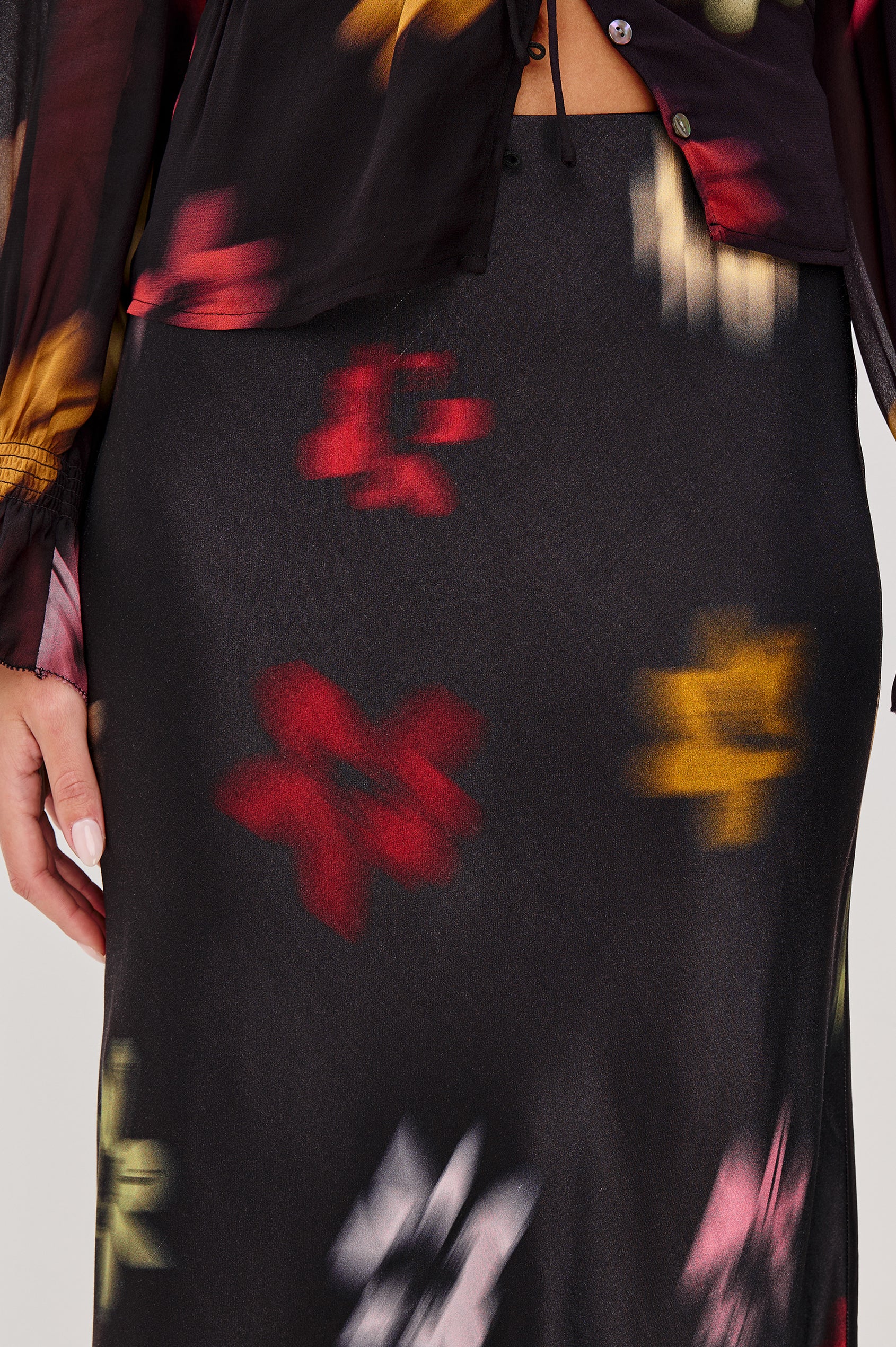 Anya High-Waisted Midi Skirt in Satin Crepe With Side Slit in Blurred Floral Colorway - Full Body Close Up Front View Featured on Model