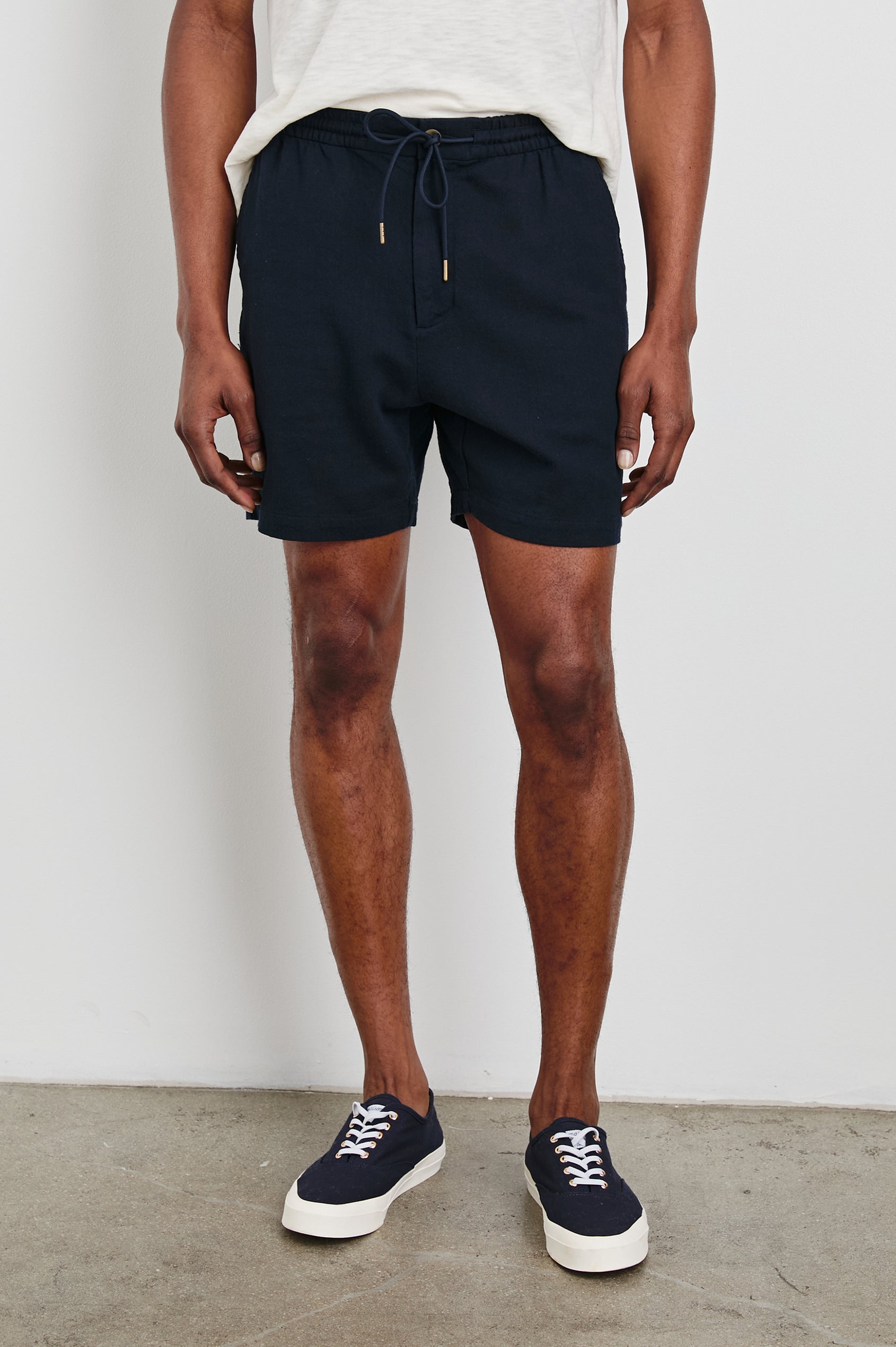 Archer Short in Cotton-Linen Blend With Relaxed Fit, Elastic Drawstring Waist, Front Zip Fly, Side Pockets, and Back Welt Pocket in Deep Meridian Colorway - Full Body Front View Featured on Model