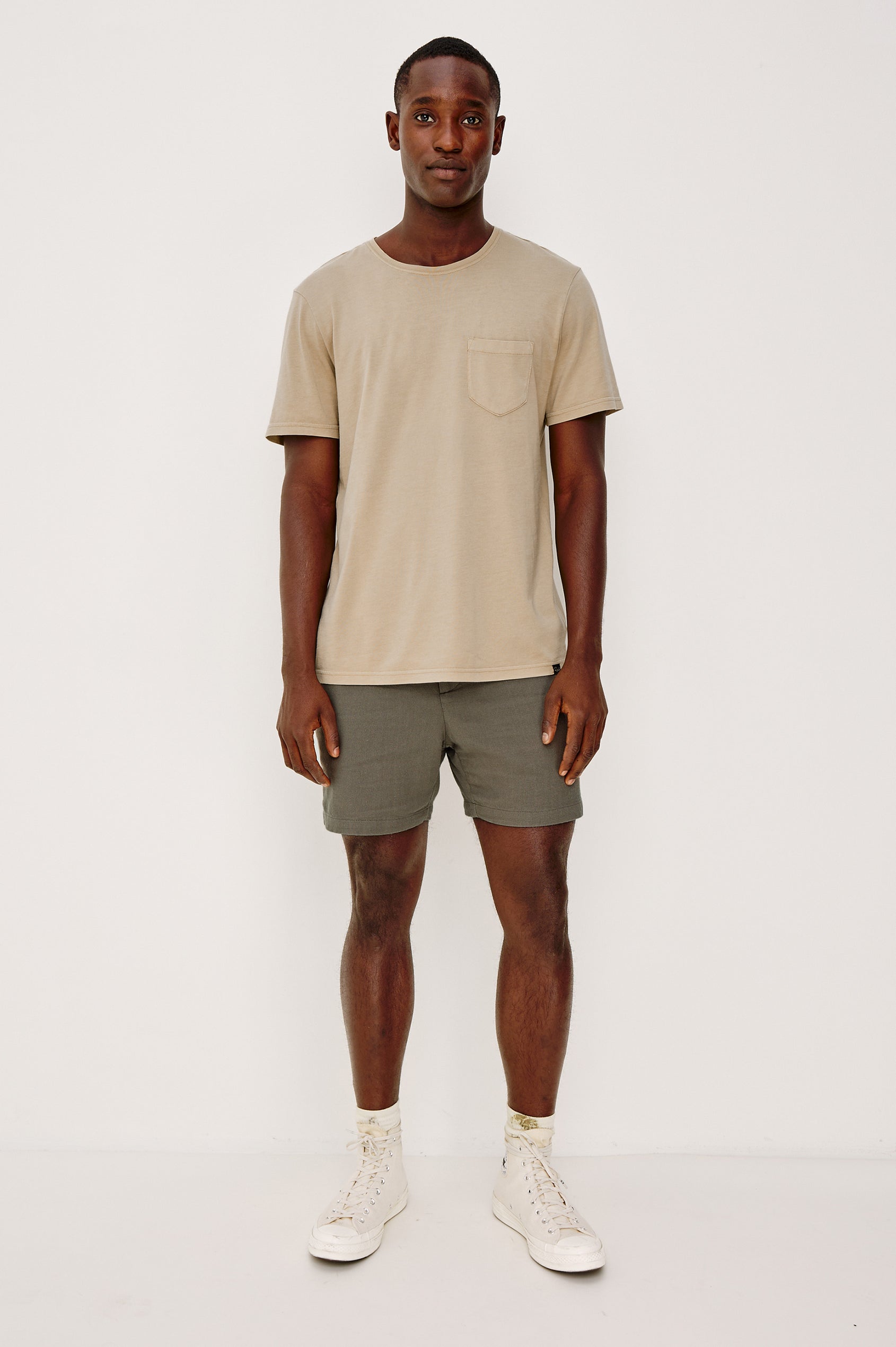 Archer Short in Unlined Cotton Linen With Relaxed Fit, Adjustable Waist Drawstring Ties, Side Pockts, and 6-Inch Inseam in Fallen Rock Colorway - Full Body Front View Featured on Model