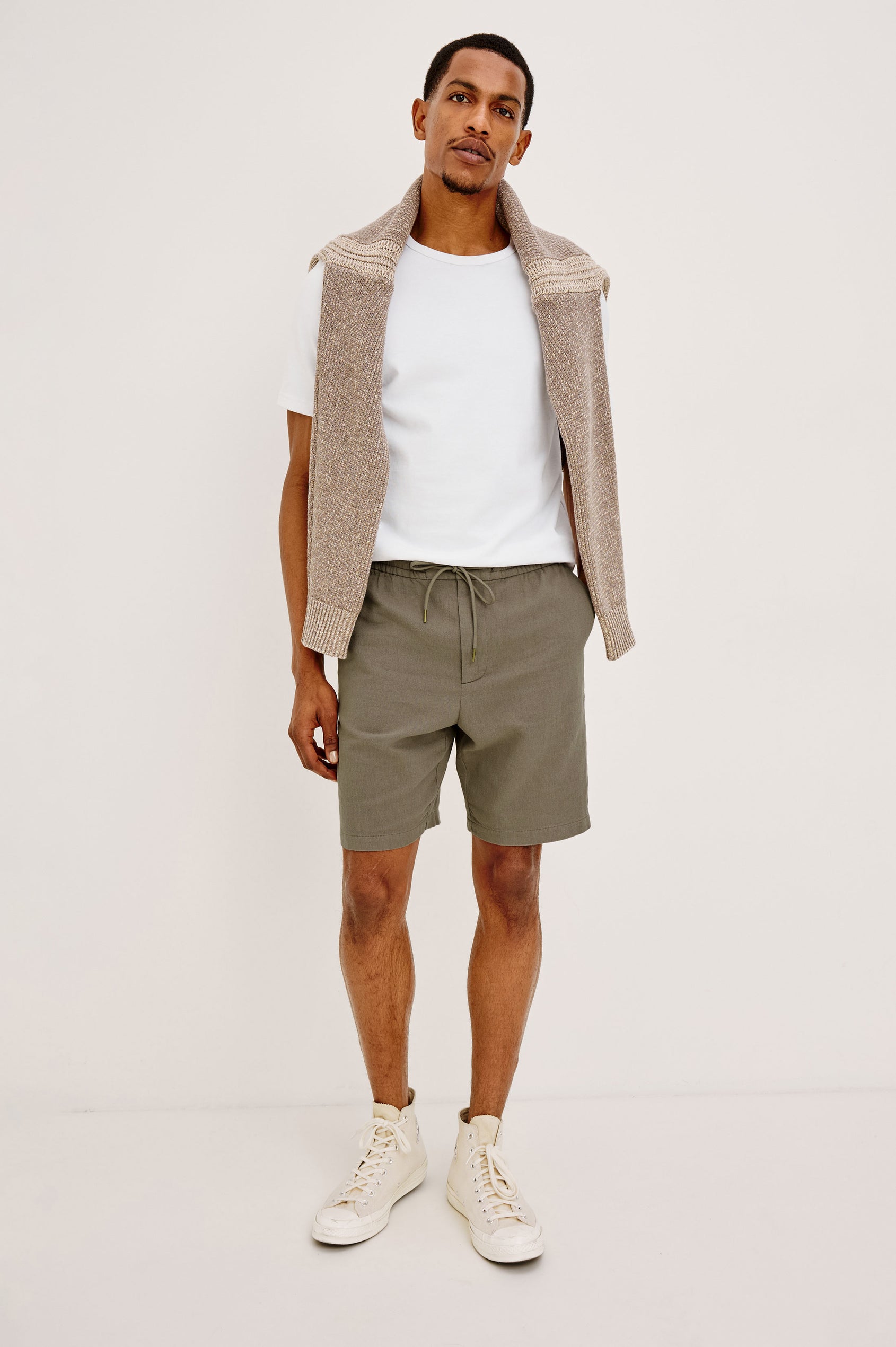 Archer Short in Unlined Cotton Linen With Relaxed Fit, Adjustable Waist Drawstring Ties, Side Pockts, and 8.5-Inch Inseam in Fallen Rock Colorway - Full Body Front View Featured on Model