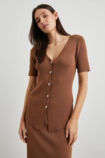 Arden Ribbed, Short Sleeve Top with a Deep V Neck and Buttons Down the Front in Cacao Colorway - Front View Featured on Model 