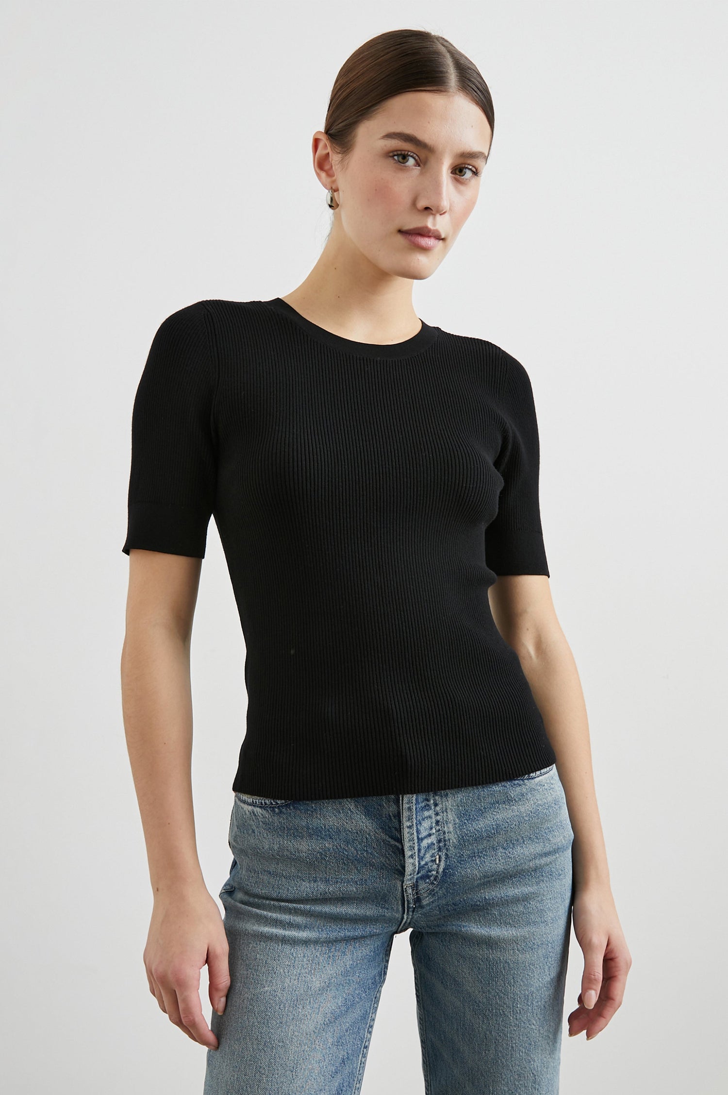 Ari Short-Sleeve Ribbed Top with a Crew Neck in Black Colorway - Front View Featured on Model