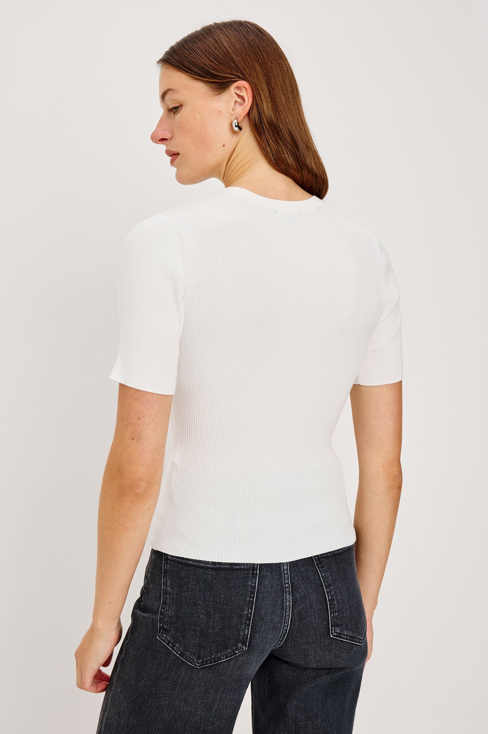 Ari Short-Sleeve Ribbed Top with a Crew Neck in White Colorway - Back View Featured on Model