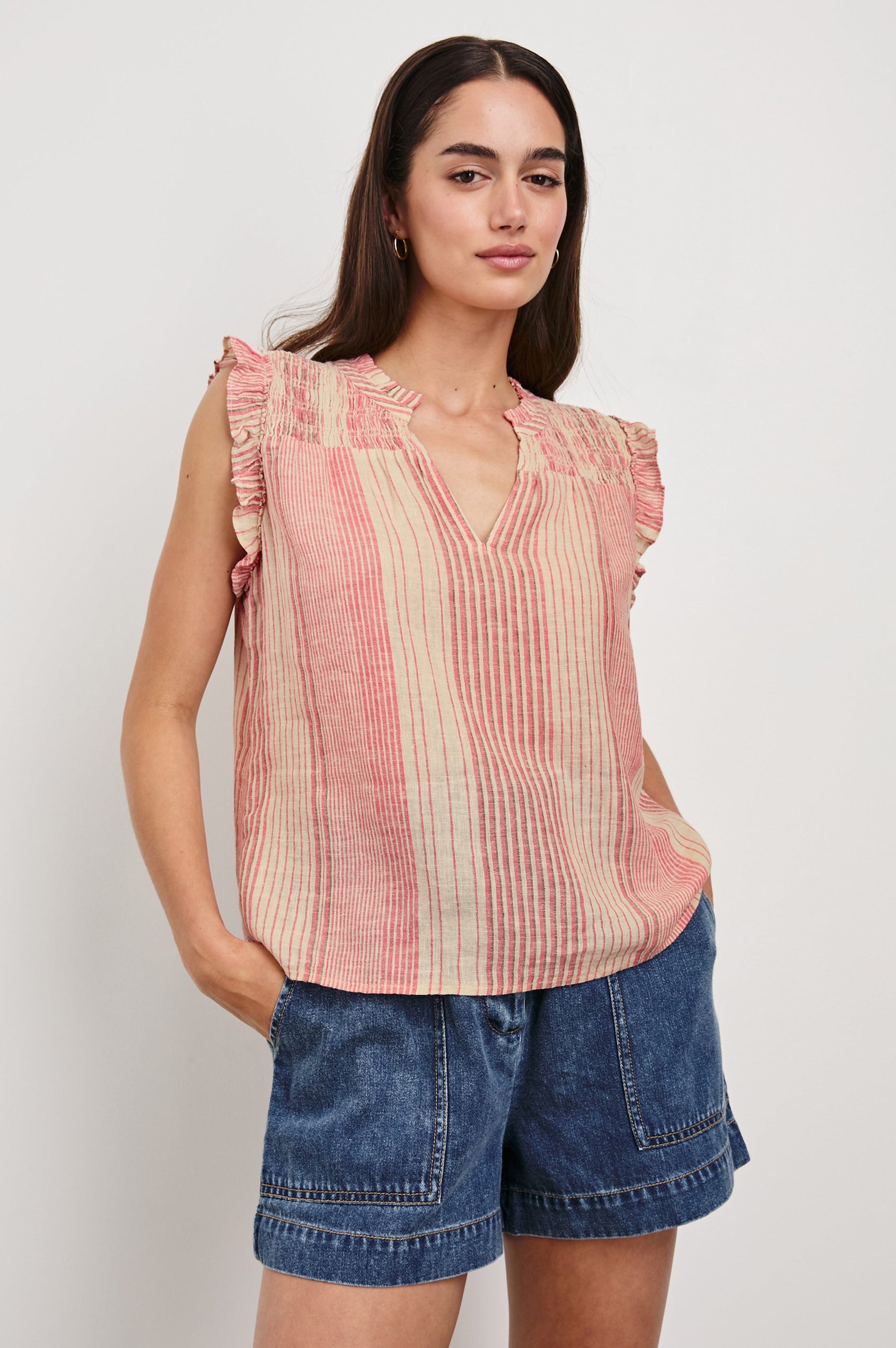 Arlene Top with Short Flutter Cap Sleeves, A V-Neckline and Shirring Along the Top Front in Salerno Stripe Colorway, Vertical Stripes in Sand and Salmon - Front Untucked View Featured on Model