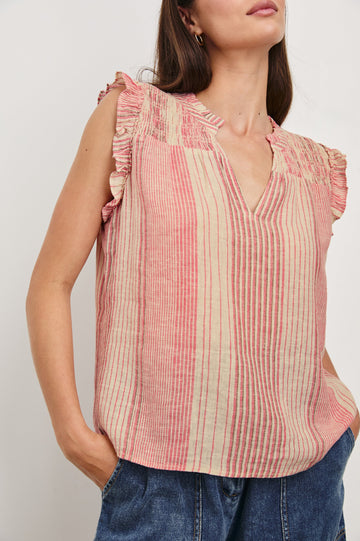Arlene Top with Short Flutter Cap Sleeves, A V-Neckline and Shirring Along the Top Front in Salerno Stripe Colorway, Vertical Stripes in Sand and Salmon - Front Untucked View Featured on Model