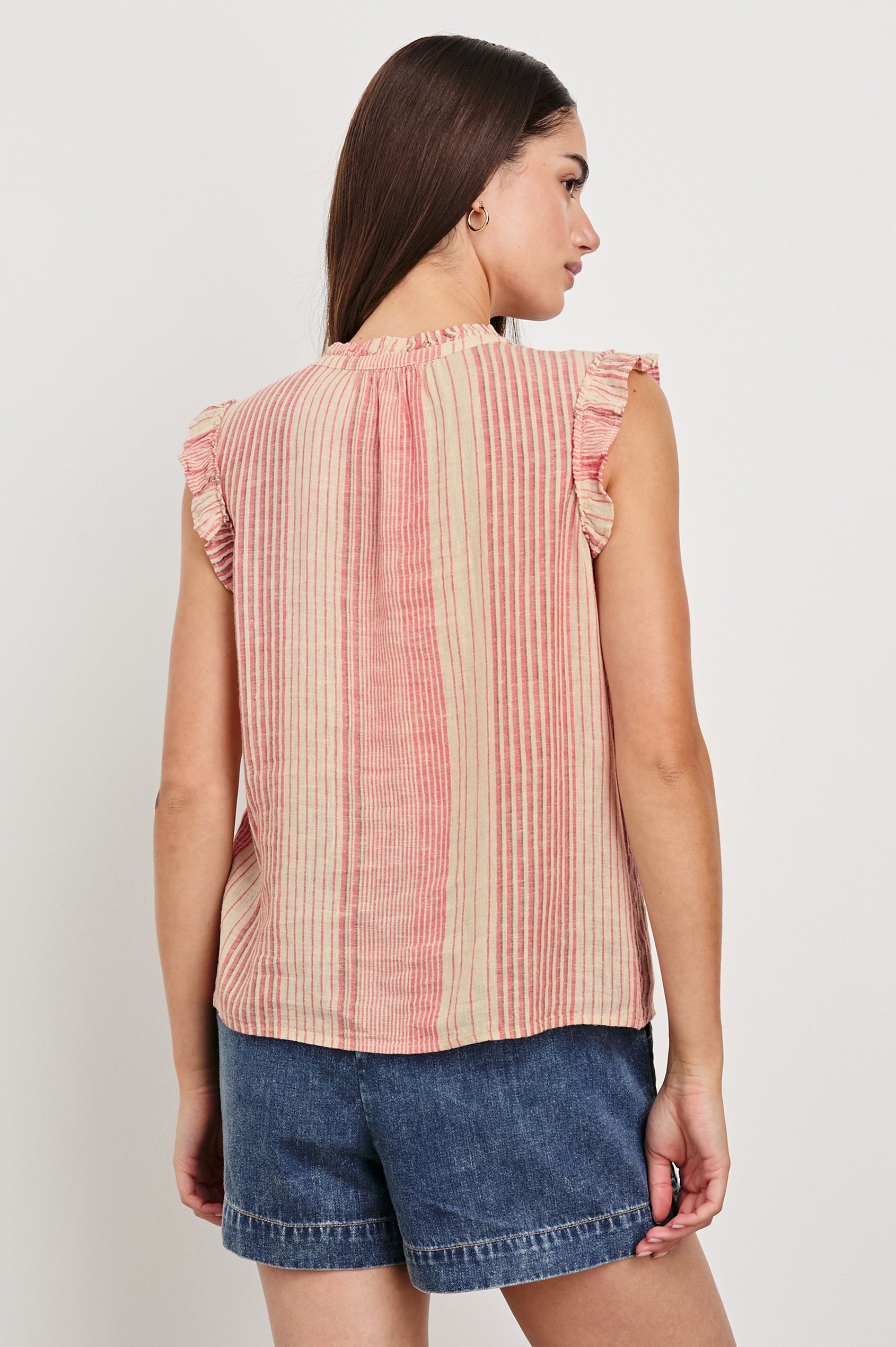 Arlene Top with Short Flutter Cap Sleeves, A V-Neckline and Shirring Along the Top Front in Salerno Stripe Colorway, Vertical Stripes in Sand and Salmon - Back Untucked View Featured on Model